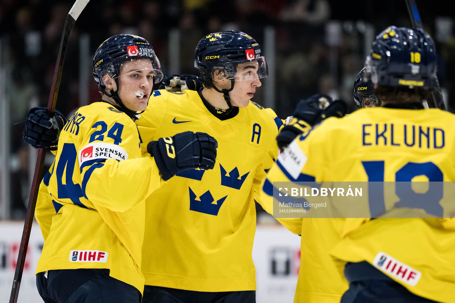 Tom Willander of Sweden celebrates with David Edstrom and