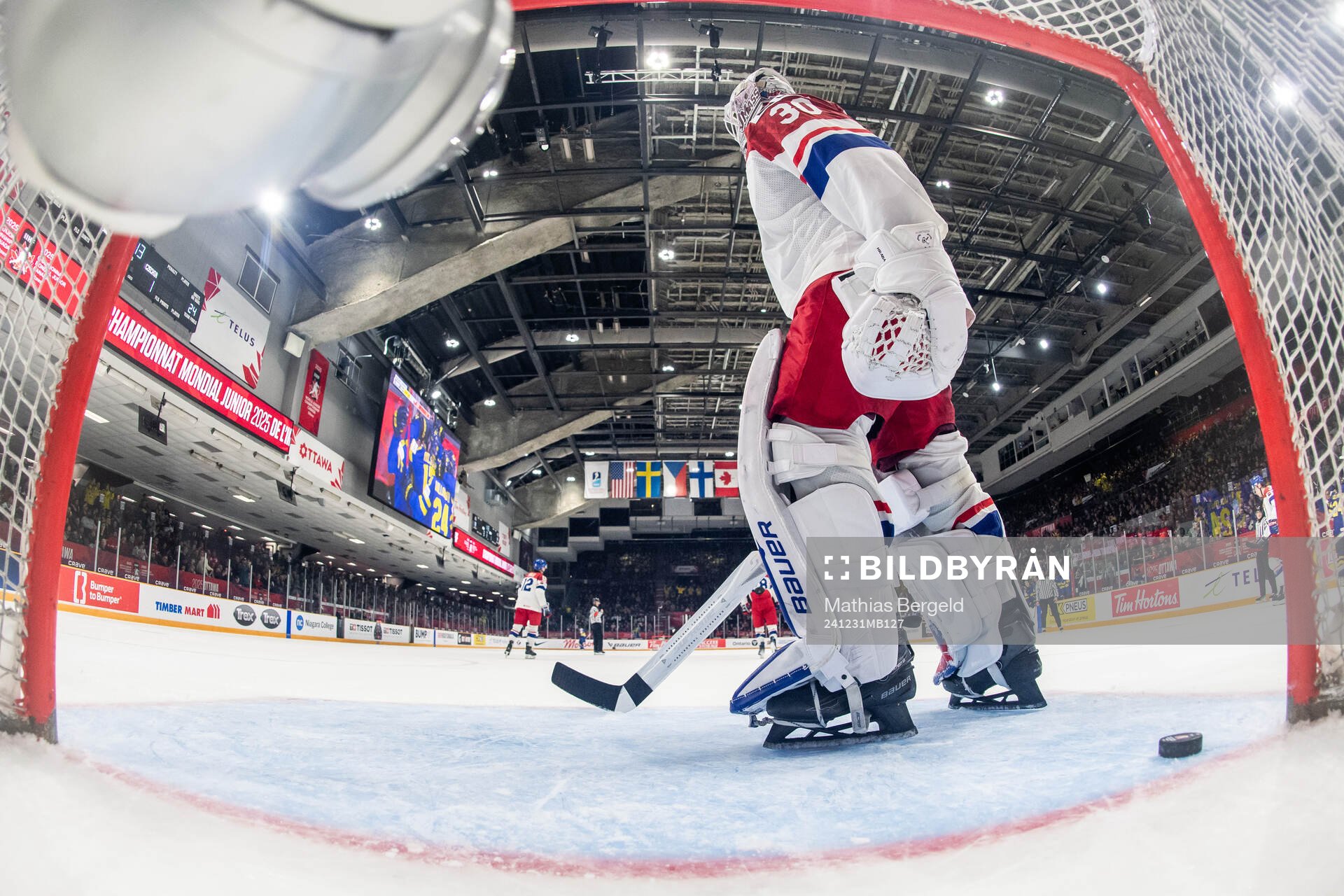 Goaltender Michael Hrabal of Czech Republic looks dejected