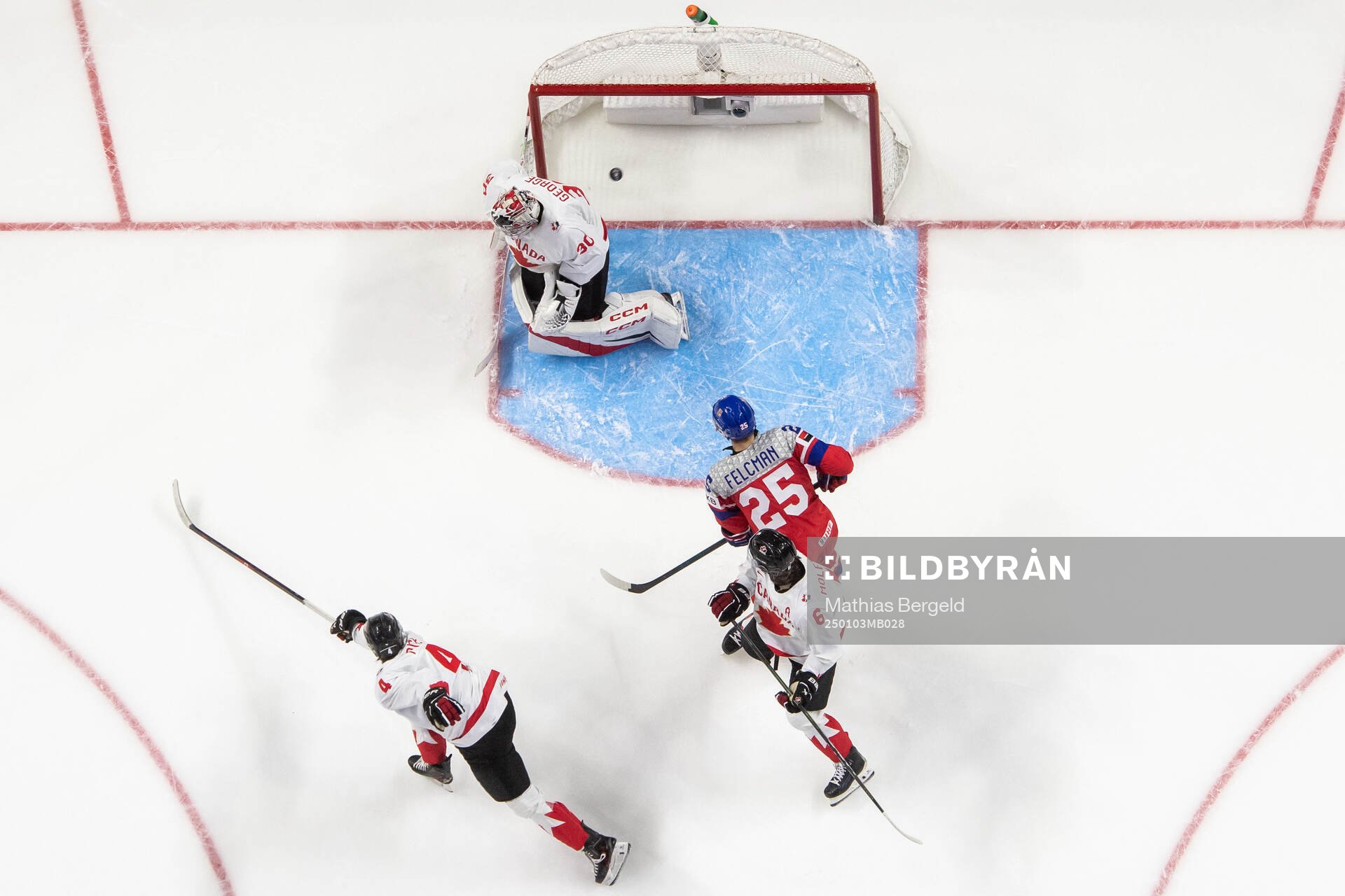 Caden Price and Tanner Molendyk of Canada with Jiri Felcman