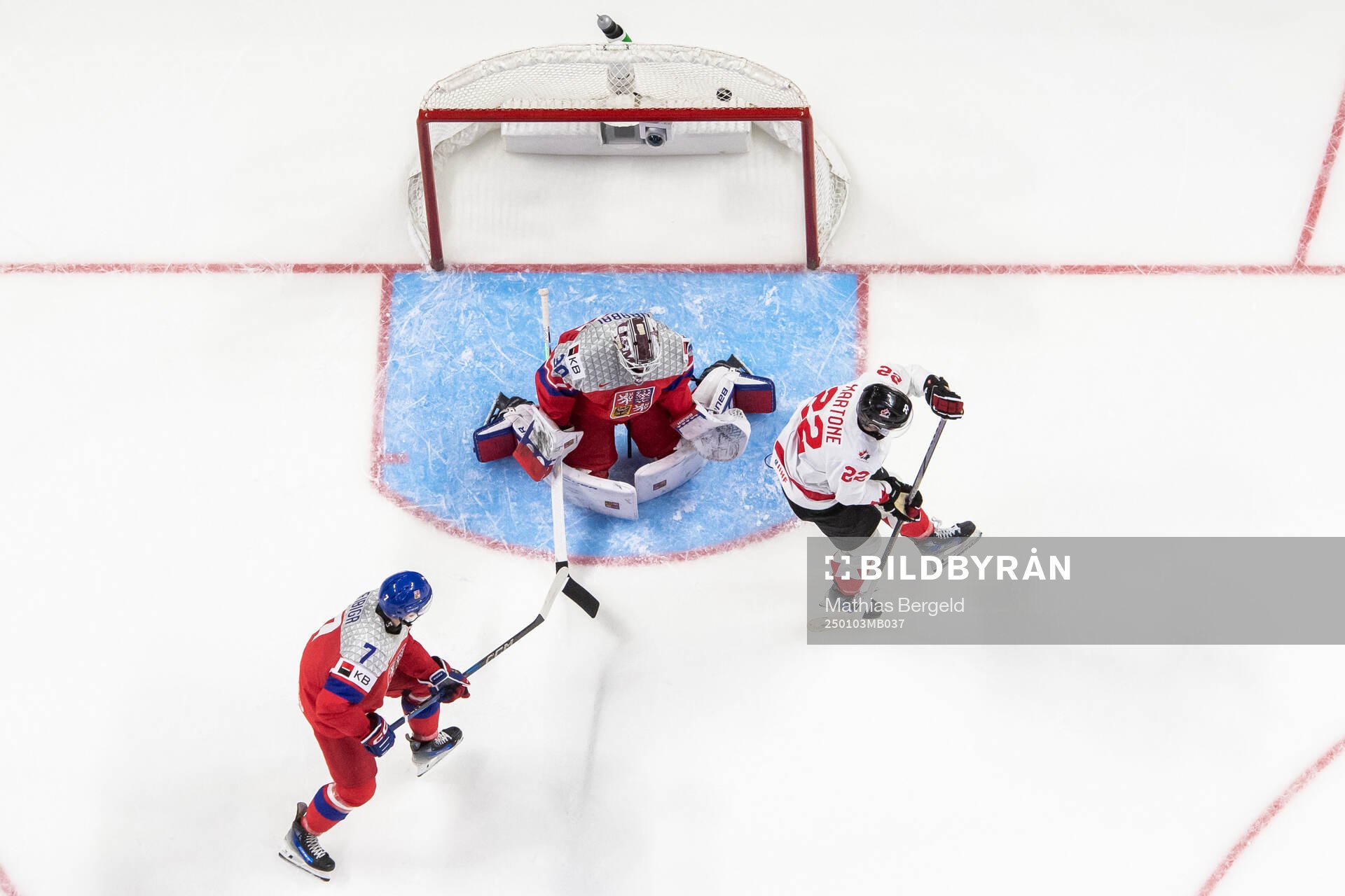 Jakub Fibigr and goaltender Michael Hrabal of Czech