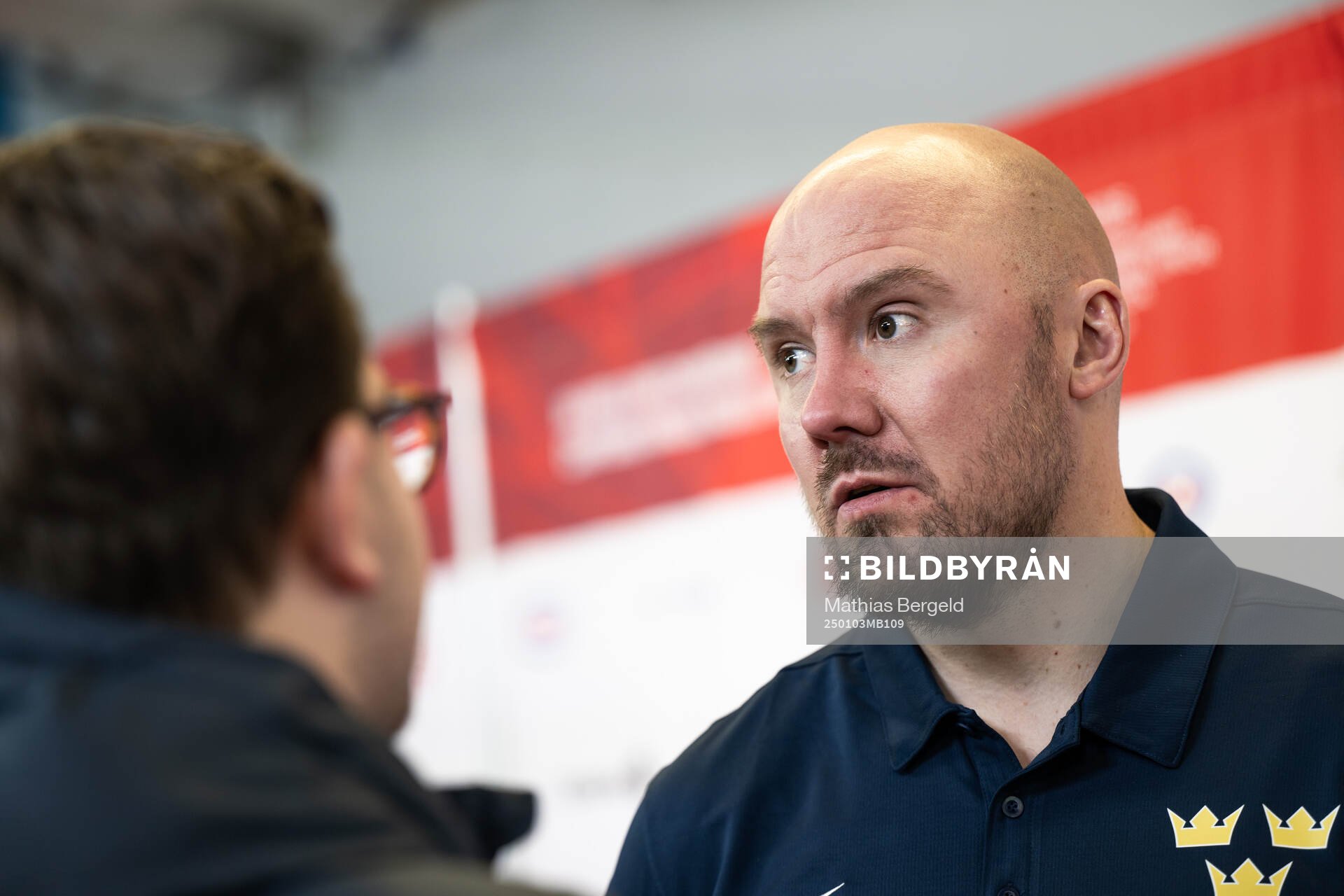 Assistant coach Nicklas Grossmann of Sweden is interviewed