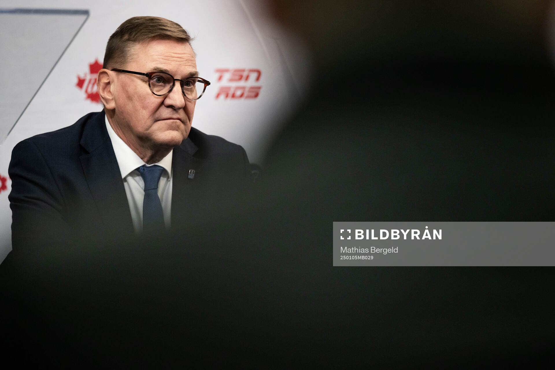 Heikki Hietanen council member of IIHF at a IIHF press