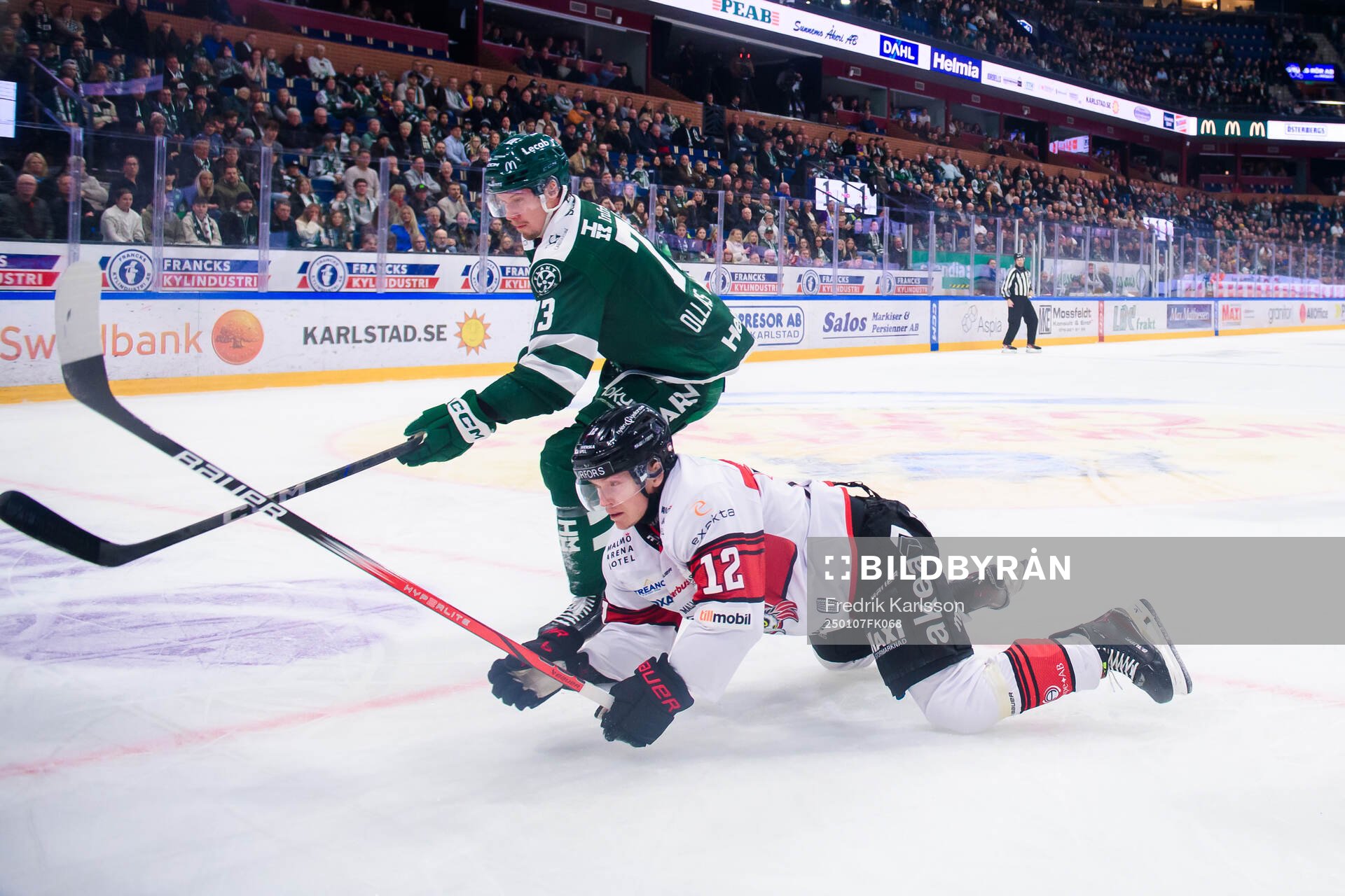 Färjestads Adam Ollas Mattsson och Malmö Redhawks Linus