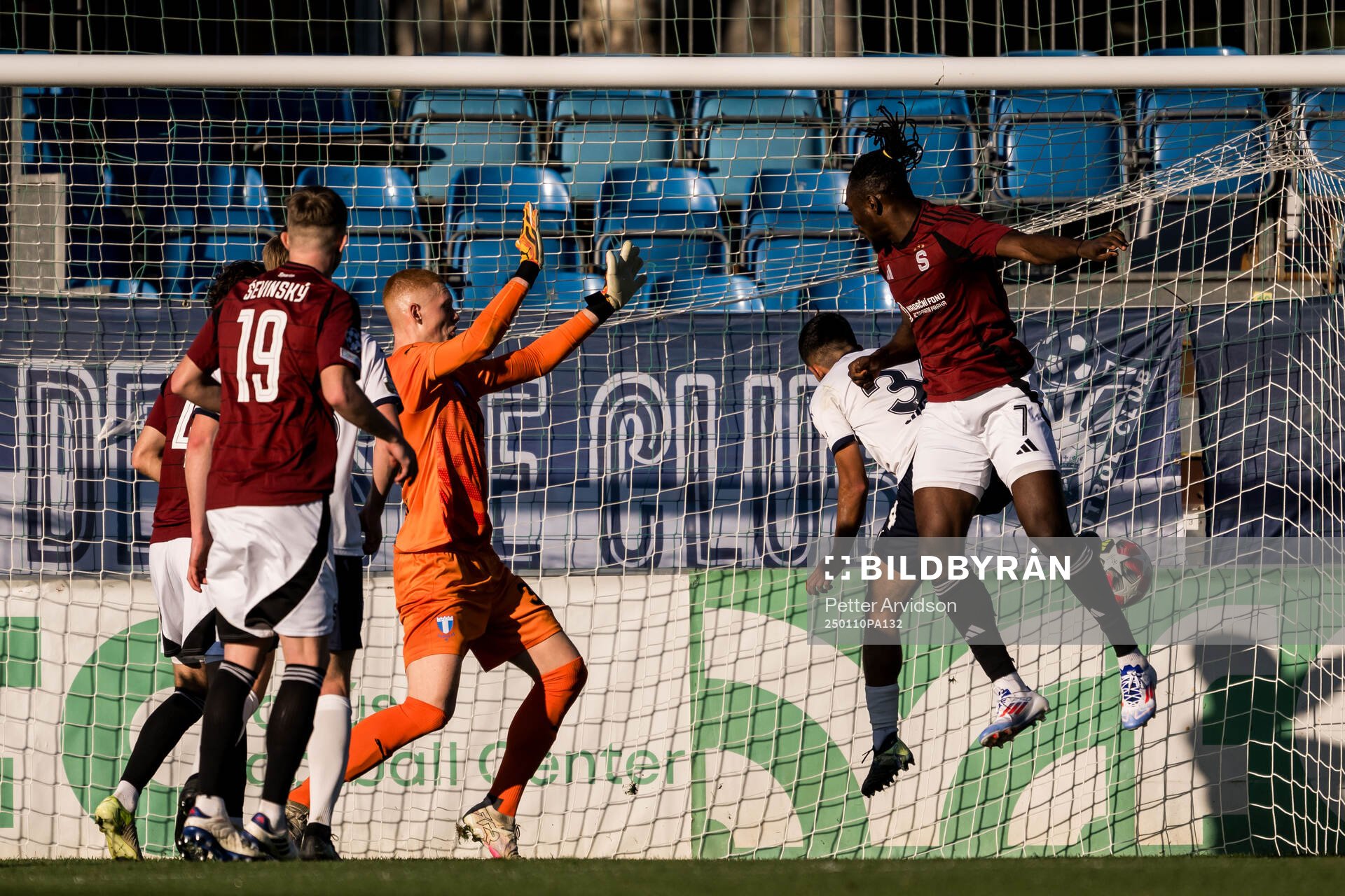 Goalkeeper Joakim Persson of Malmö FF and Victor Olatunji