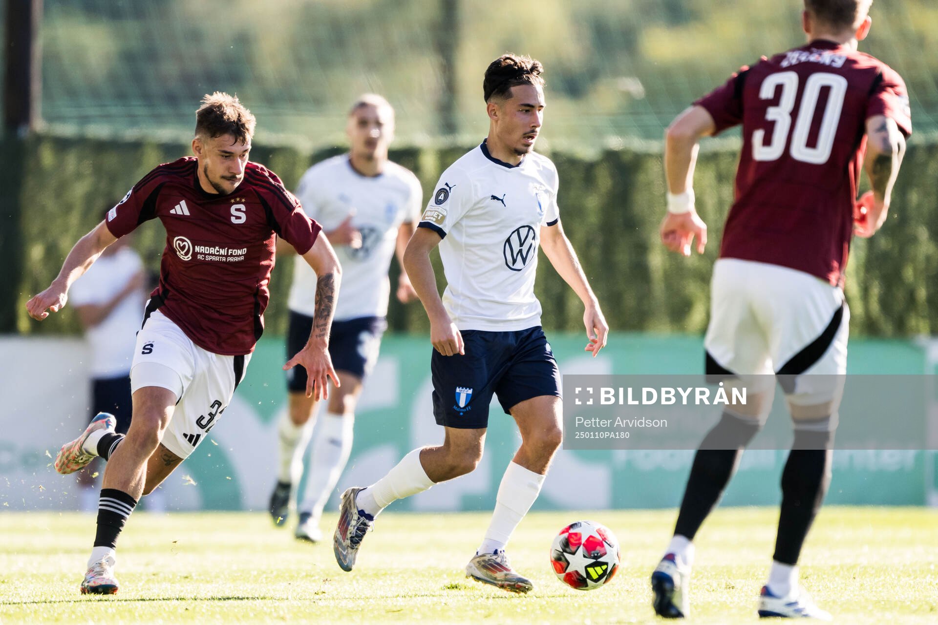 Elias Cobbaut of Sparta Prag and Adrian Skogmar of Malmö FF