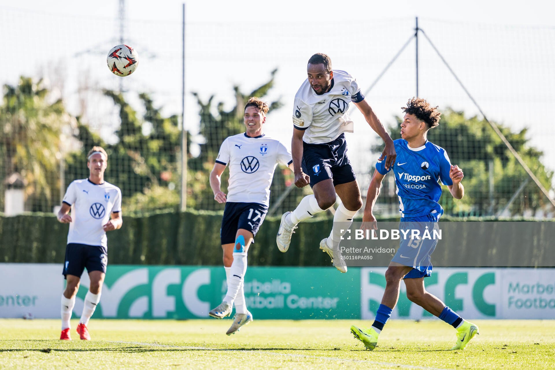 Isaac Kiese Thelin of Malmö FF and Kenny Ogboi of Slovan