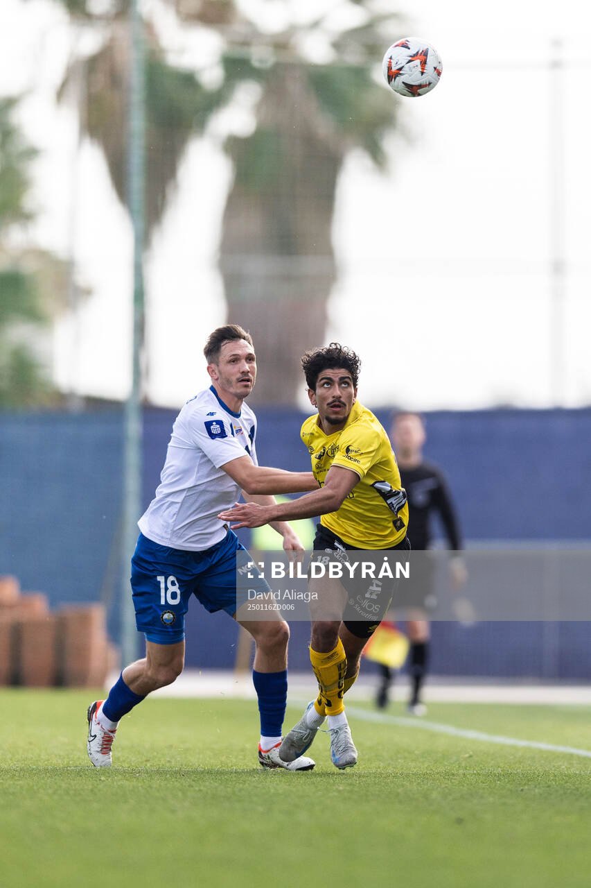 Piotr Wlazlo of FKS Stal Mielec and Ahmed Qasem of Elfsborg