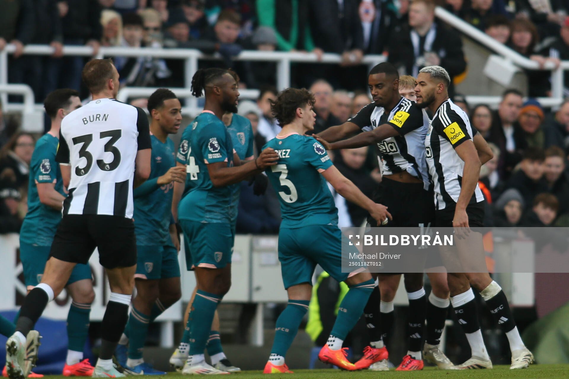 Alexander Isak of Newcastle United pushes AFC Bournemouth's