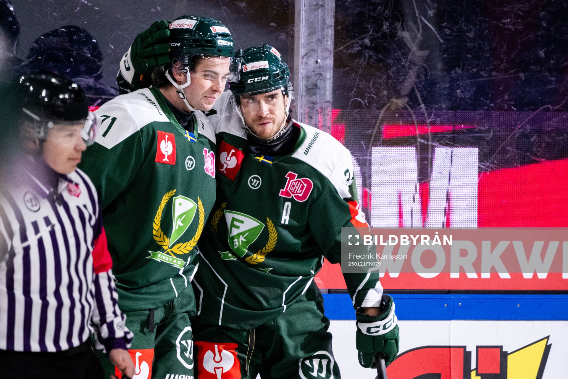 Viktor Lodin and Michael Lindqvist of Färjestad celebrate