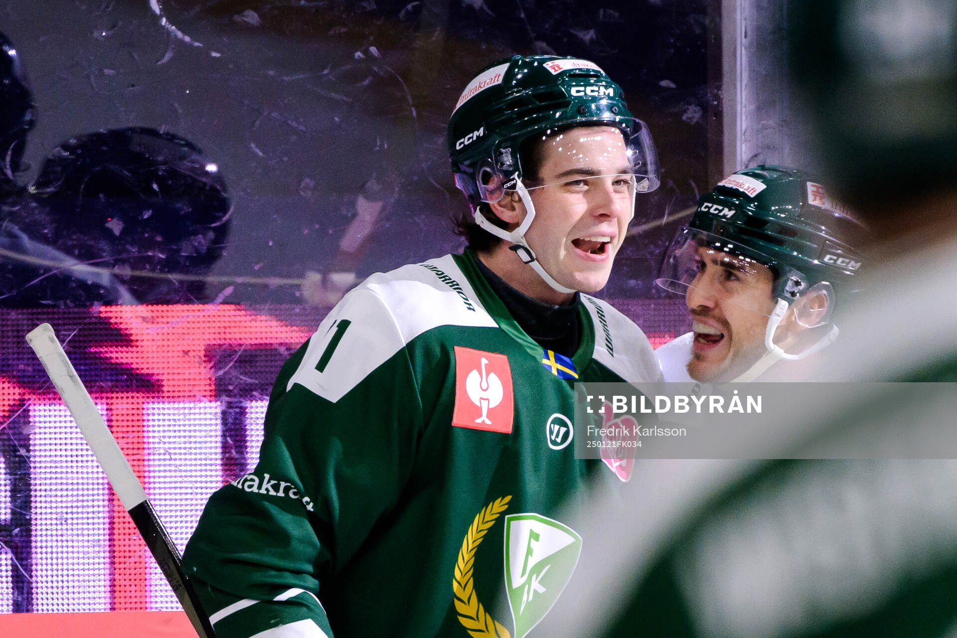 Viktor Lodin and Michael Lindqvist of Färjestad  celebrates