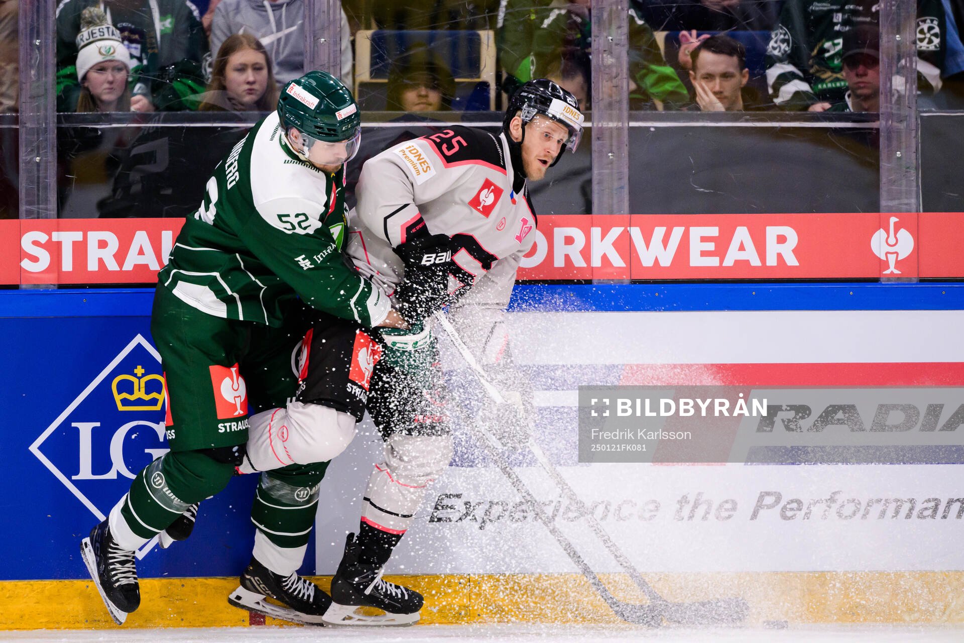 August Tornberg of Färjestad  and Jani Lajunen