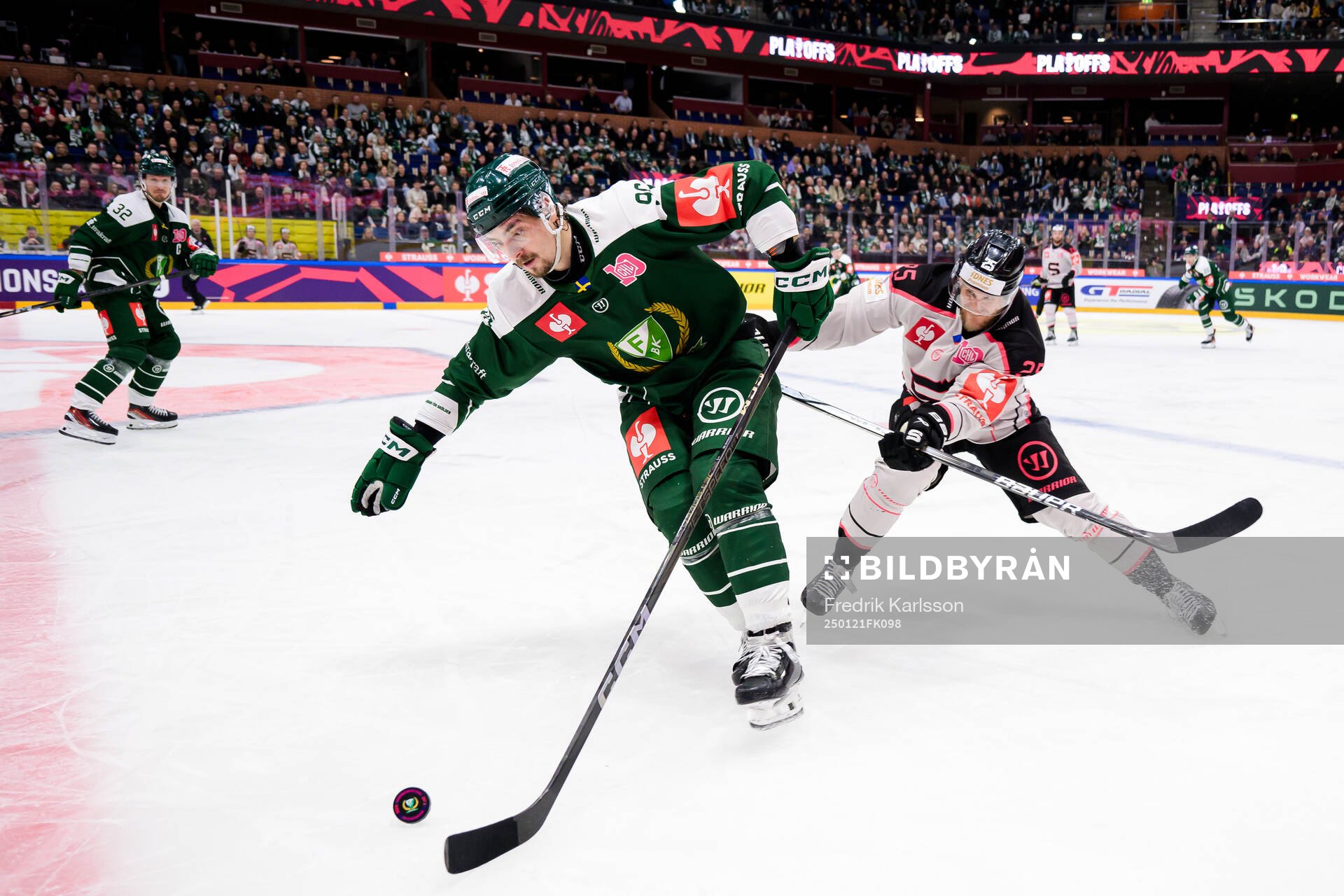David Tomasek of Färjestad  and Jani Lajunen