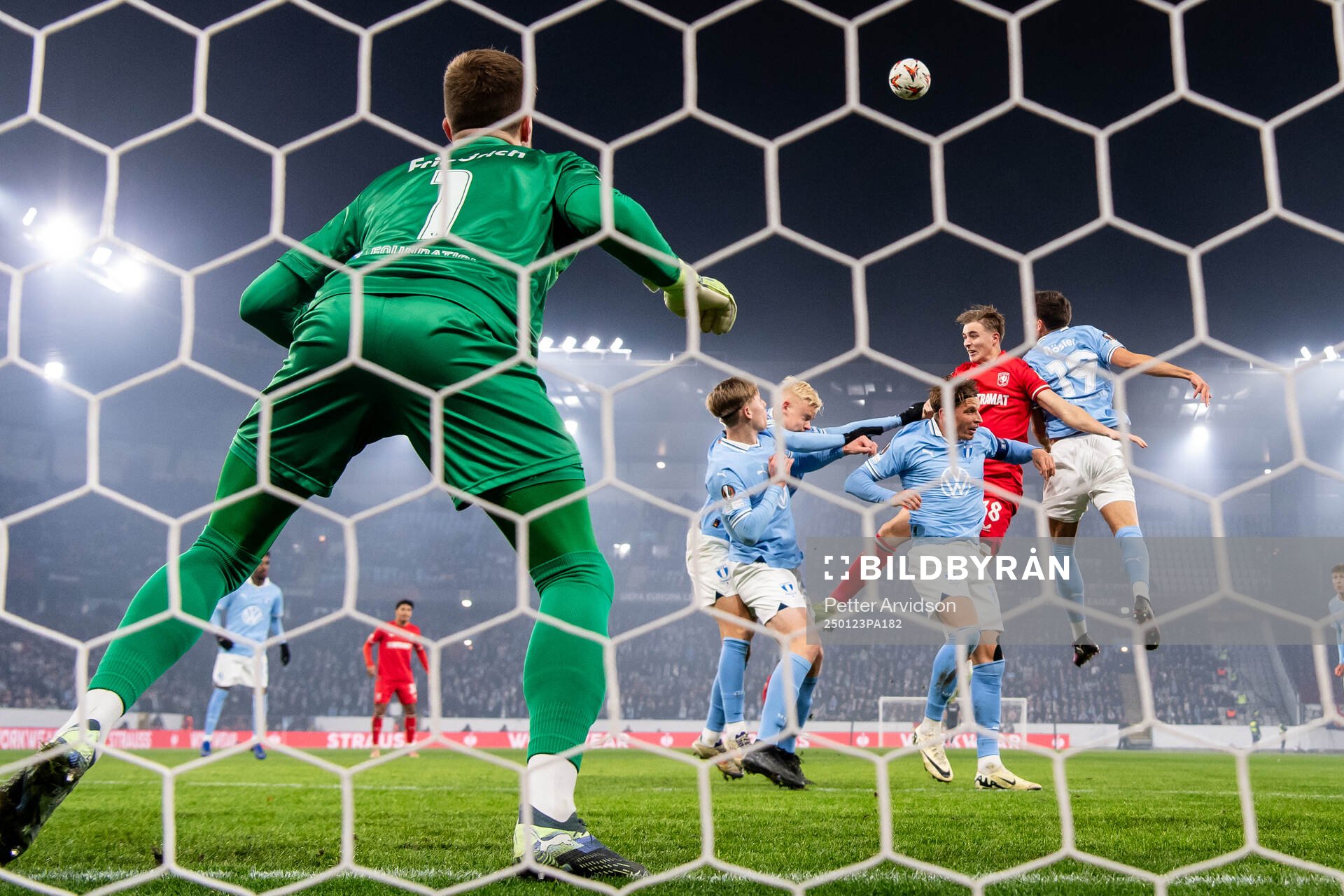 Max Bruns of Twente in action with Otto Rosengren, Nils