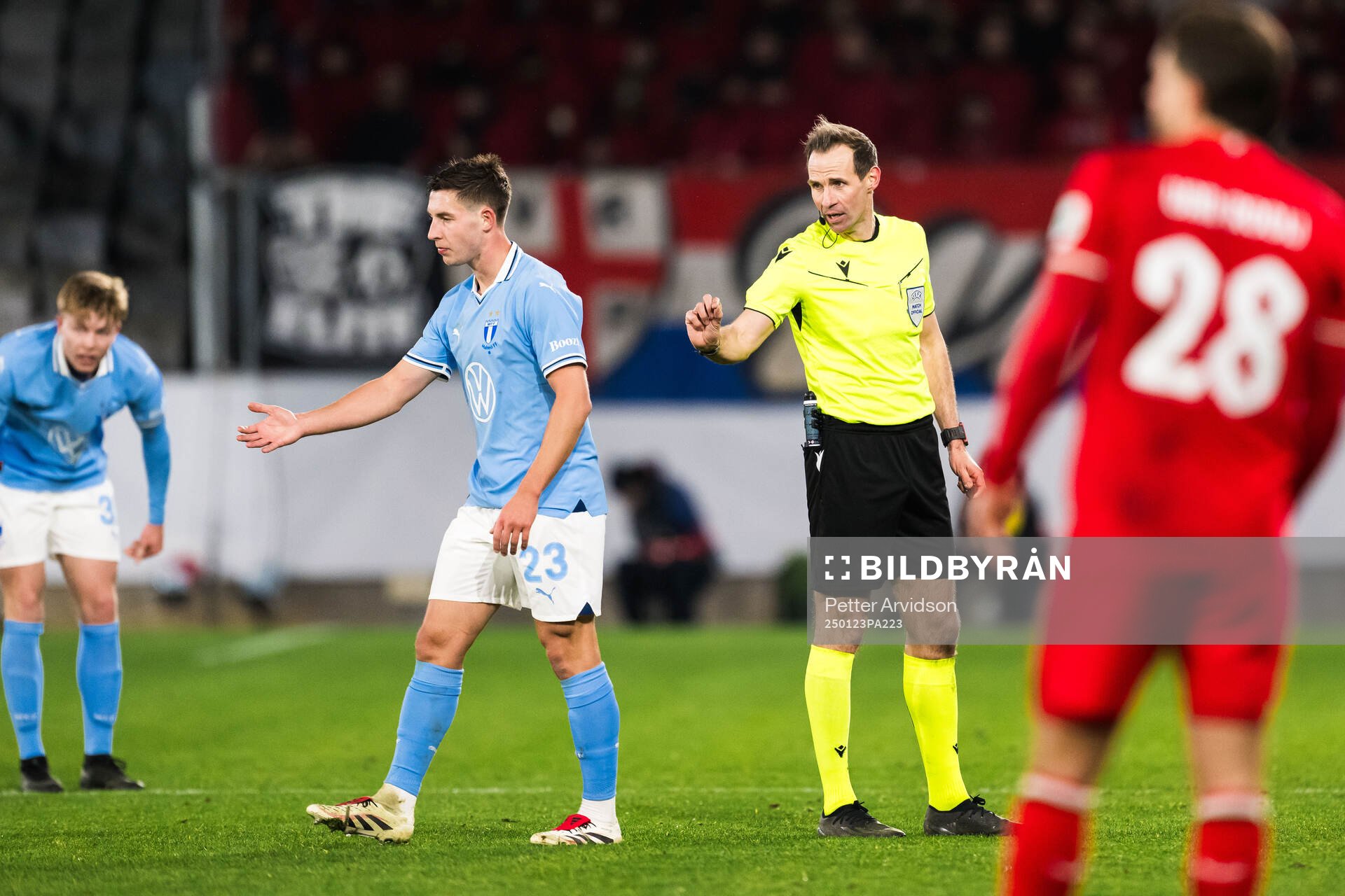 Lasse Berg Johnsen of Malmö FF and Referee Sascha Stegemann