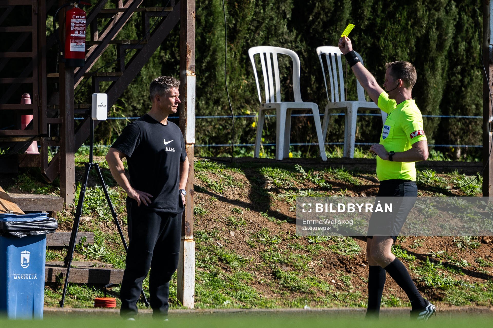 Head coach Mikkjal Thomassen of AIK receives a yellow card