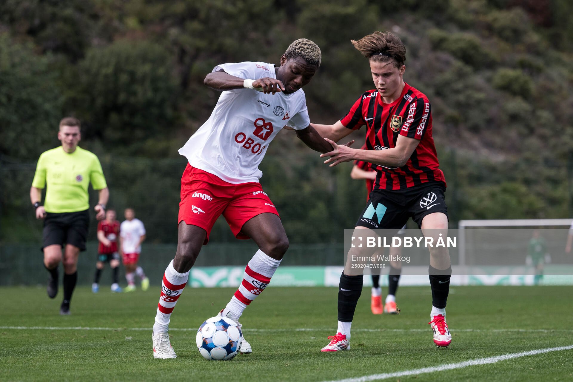 Maxwell Woledzi of Fredrikstad and Love Arrhov of