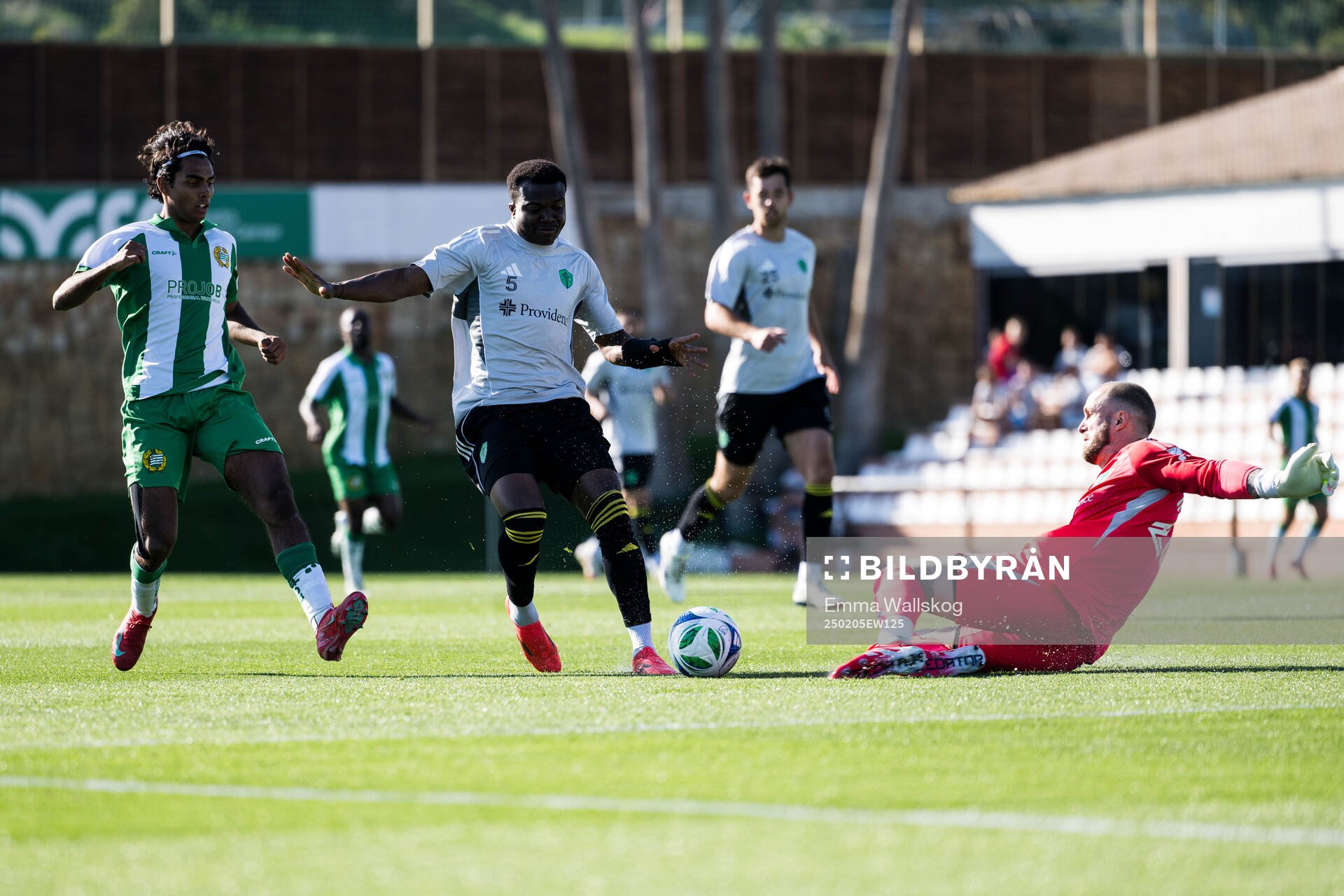Jonathan Karlsson of Hammarby and Nouhou and Goalkeeper