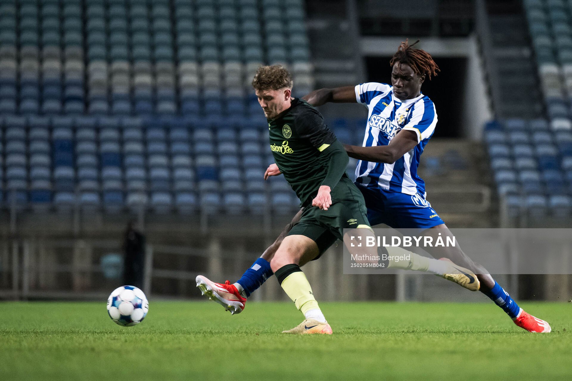 Ethan Laidlaw of Brentford B and Rockson Yeboah of IFK