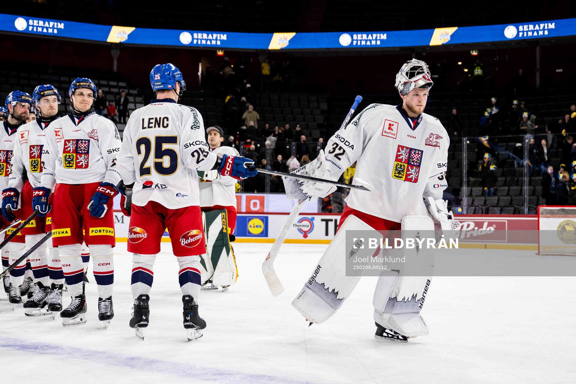 Goaltender Josef Korenar of Czech Republic is awarded