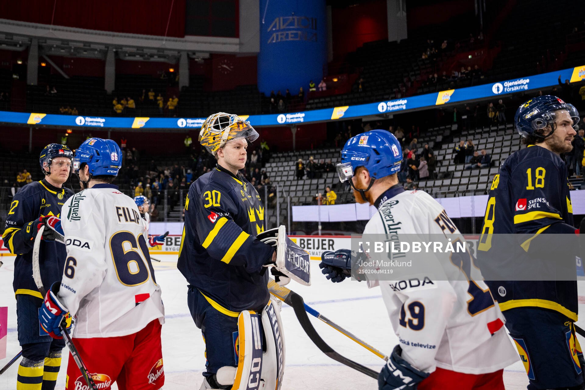 Fredrik Olofsson, goaltender Linus Söderström and Dennis