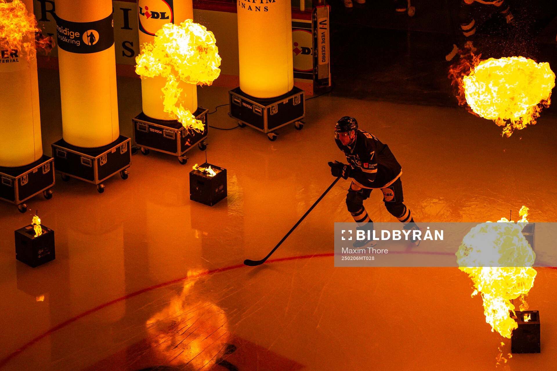 Henrik Tömmernes of Sweden enters the ice