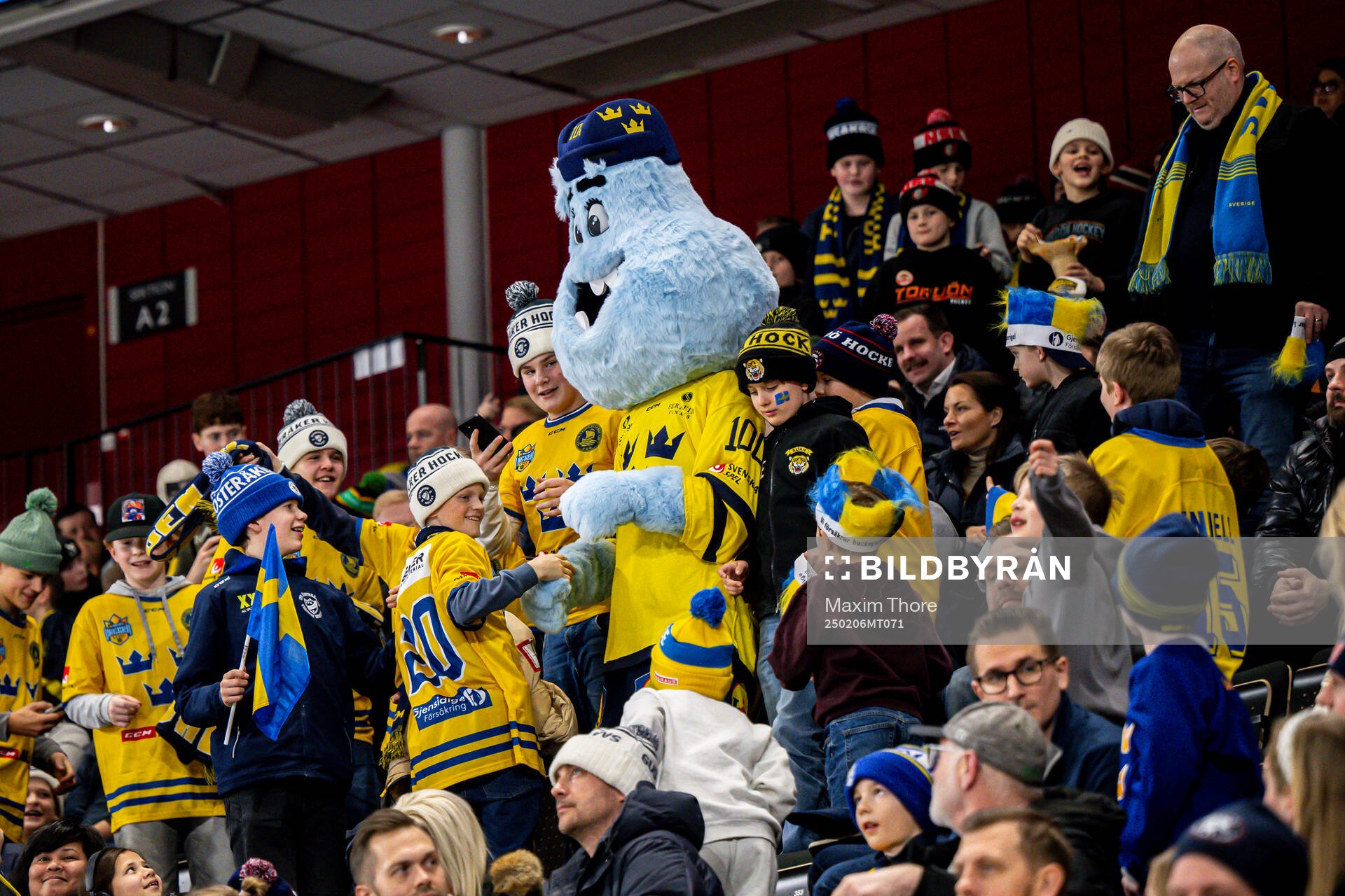 Fans take pictures with the IIHF 2025 Stockholm Ice Hockey