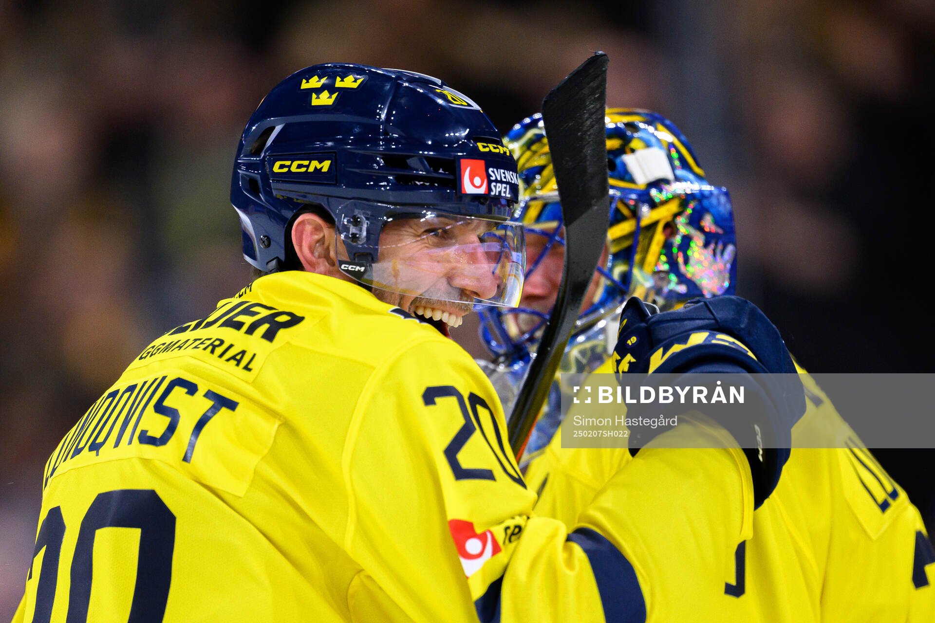 Joel Lundqvist and goaltender Henrik Lundqvist celebrate