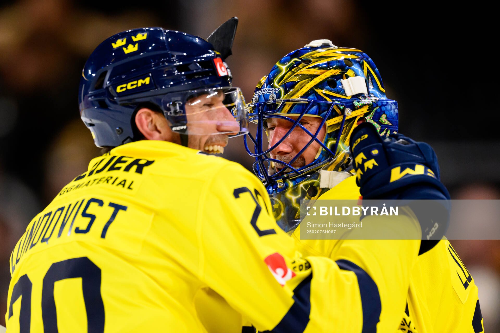 Joel Lundqvist and goaltender Henrik Lundqvist of Tre