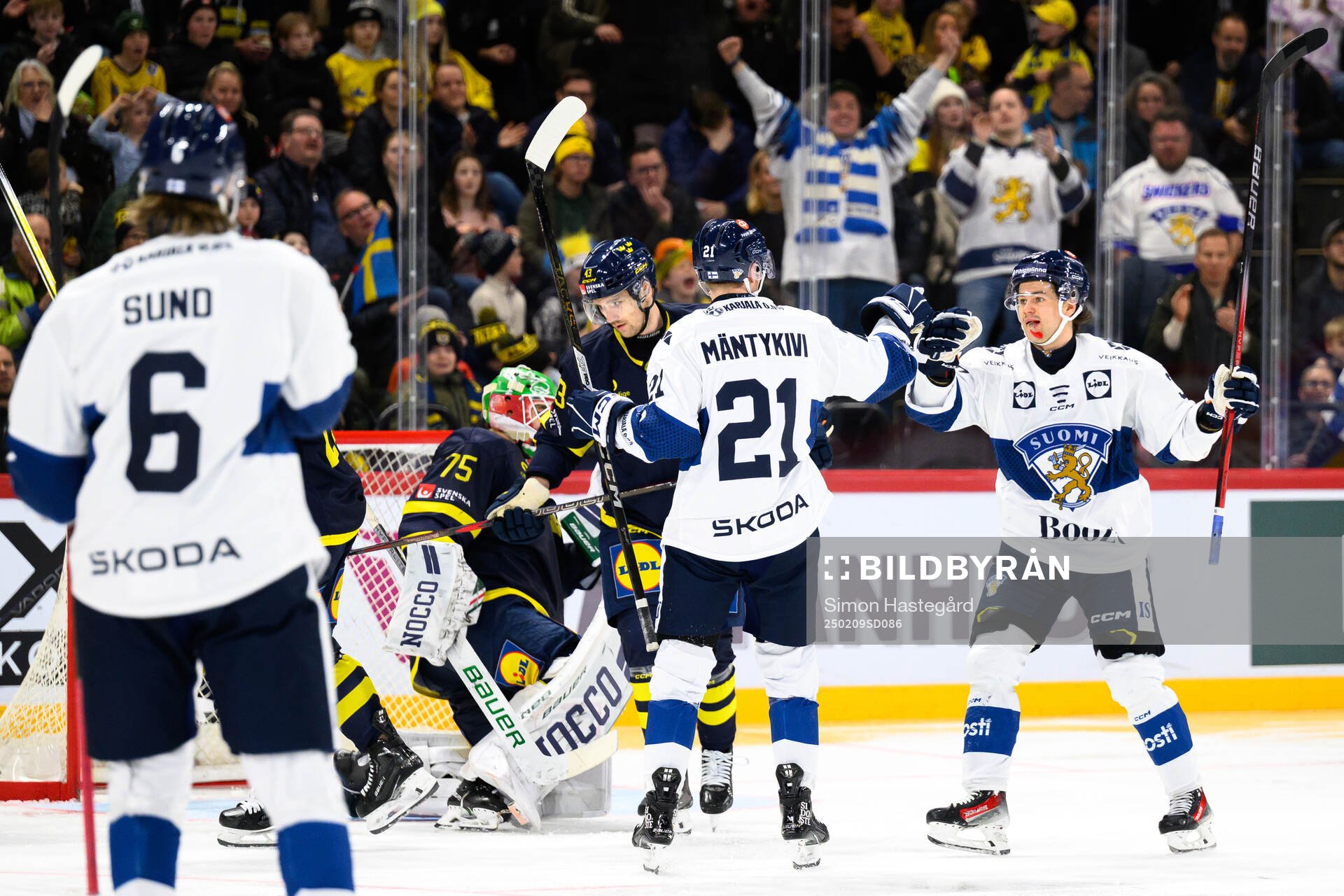Matias Mäntykivi and Eemil Erholtz of Finland celebrate