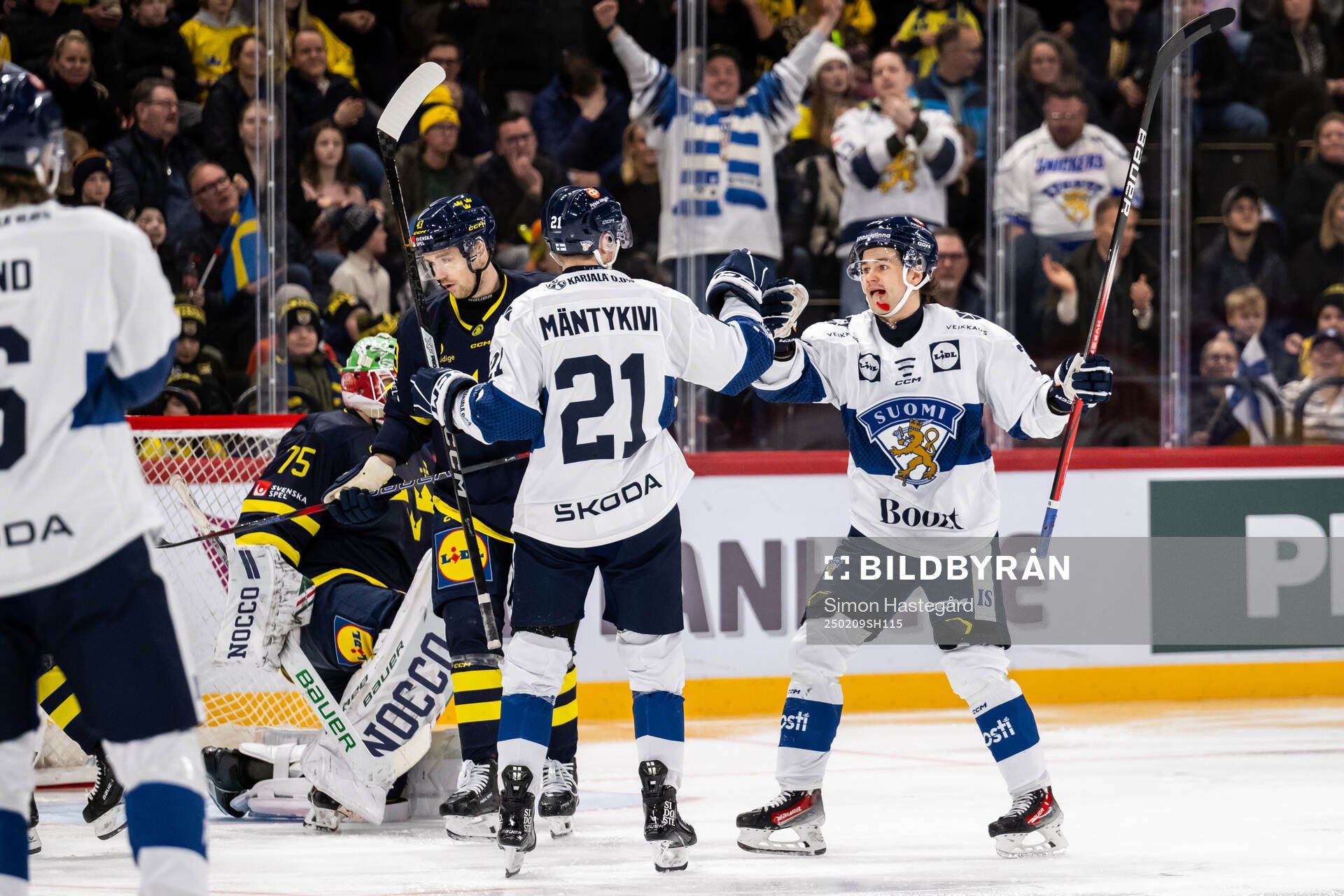Matias Mäntykivi and Saku Maenalanen celebrate