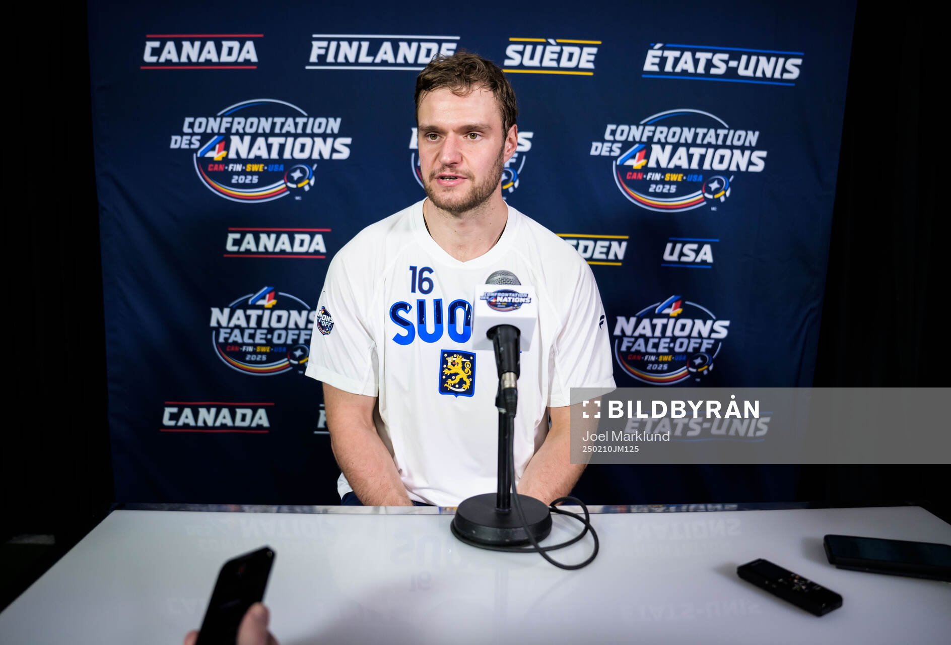 Aleksander Barkov of Finland is being interviewed by media