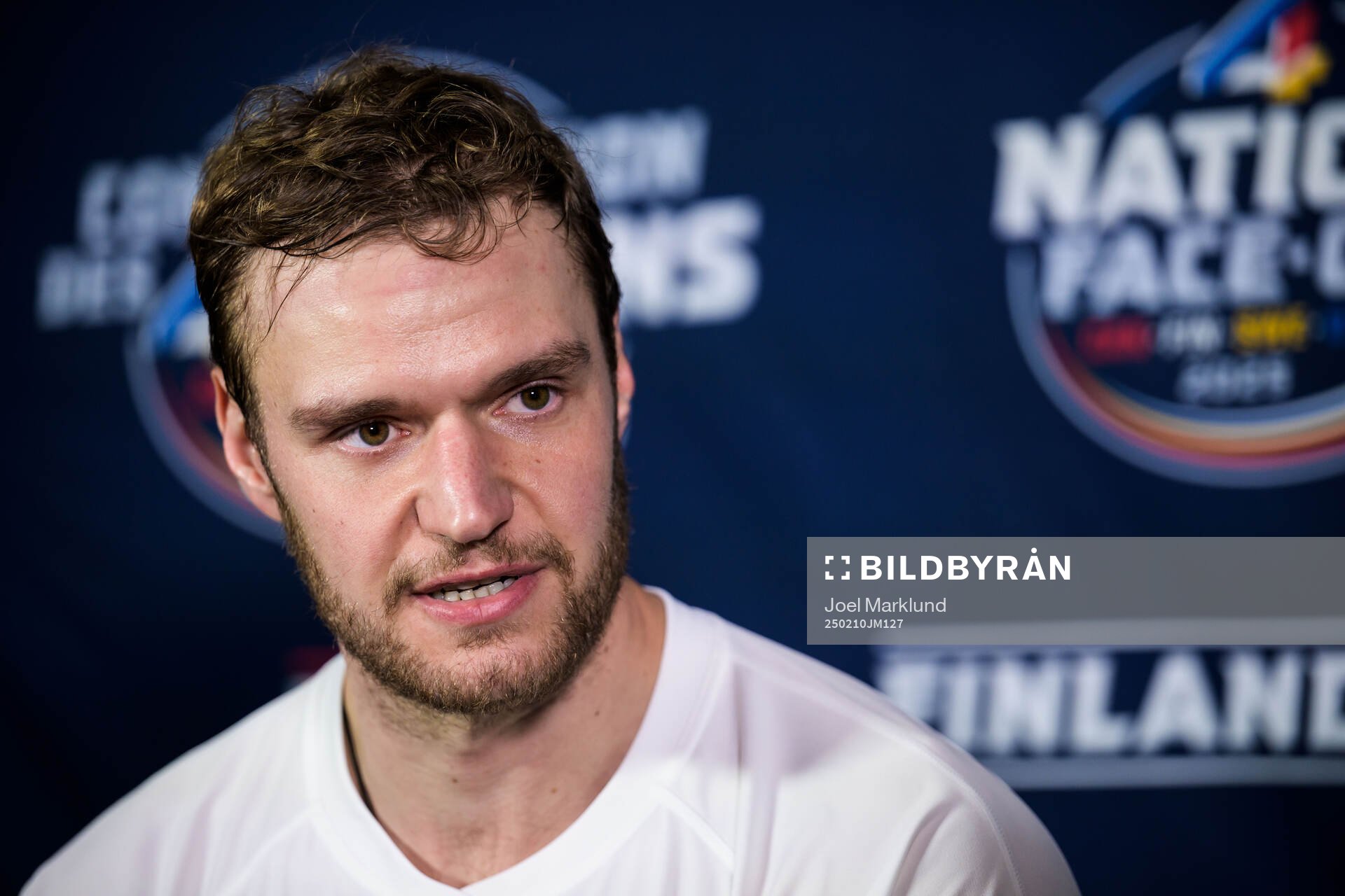 Aleksander Barkov of Finland is being interviewed by media