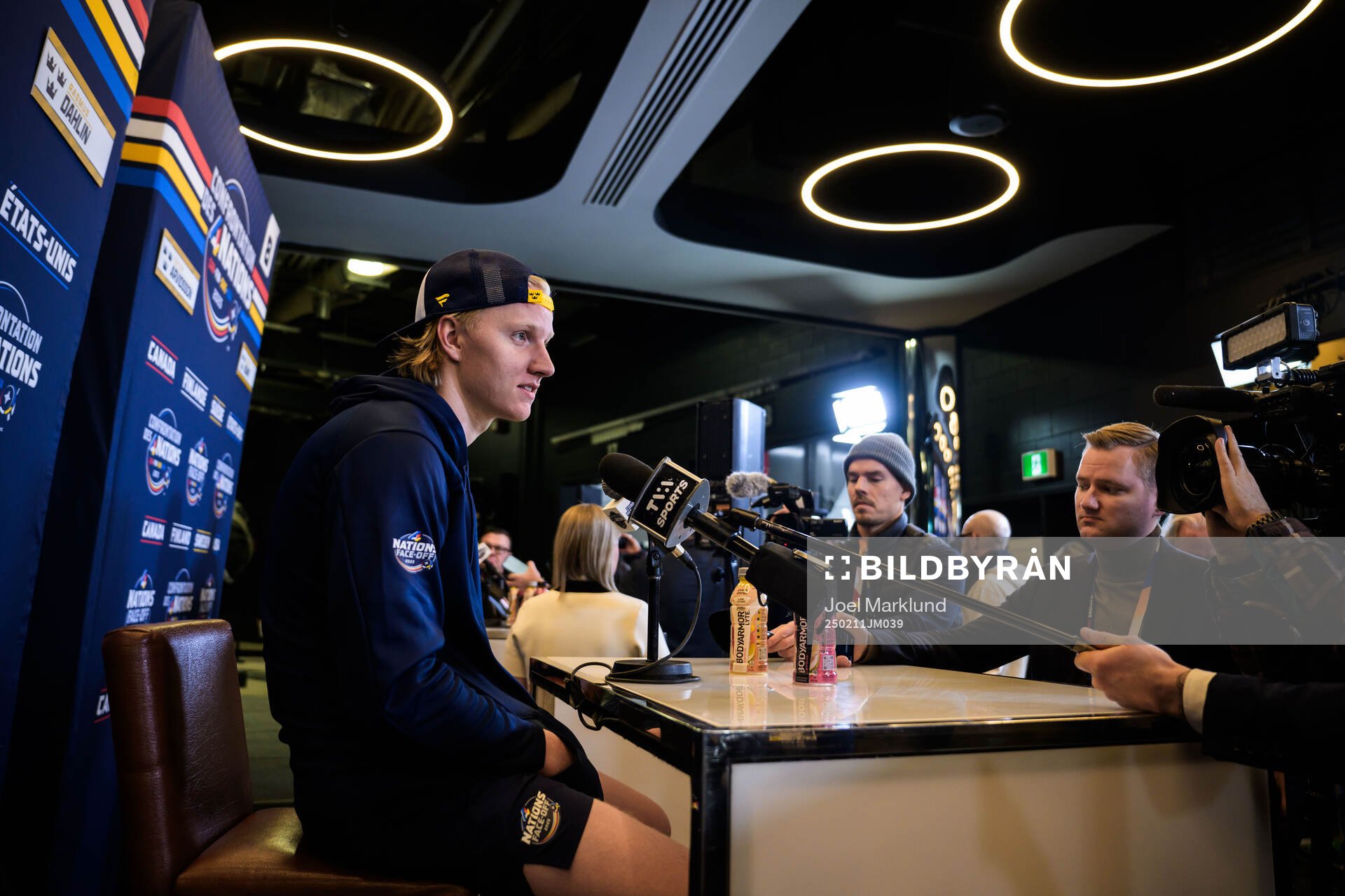Rasmus Dahlin of Sweden is being interviewed by media