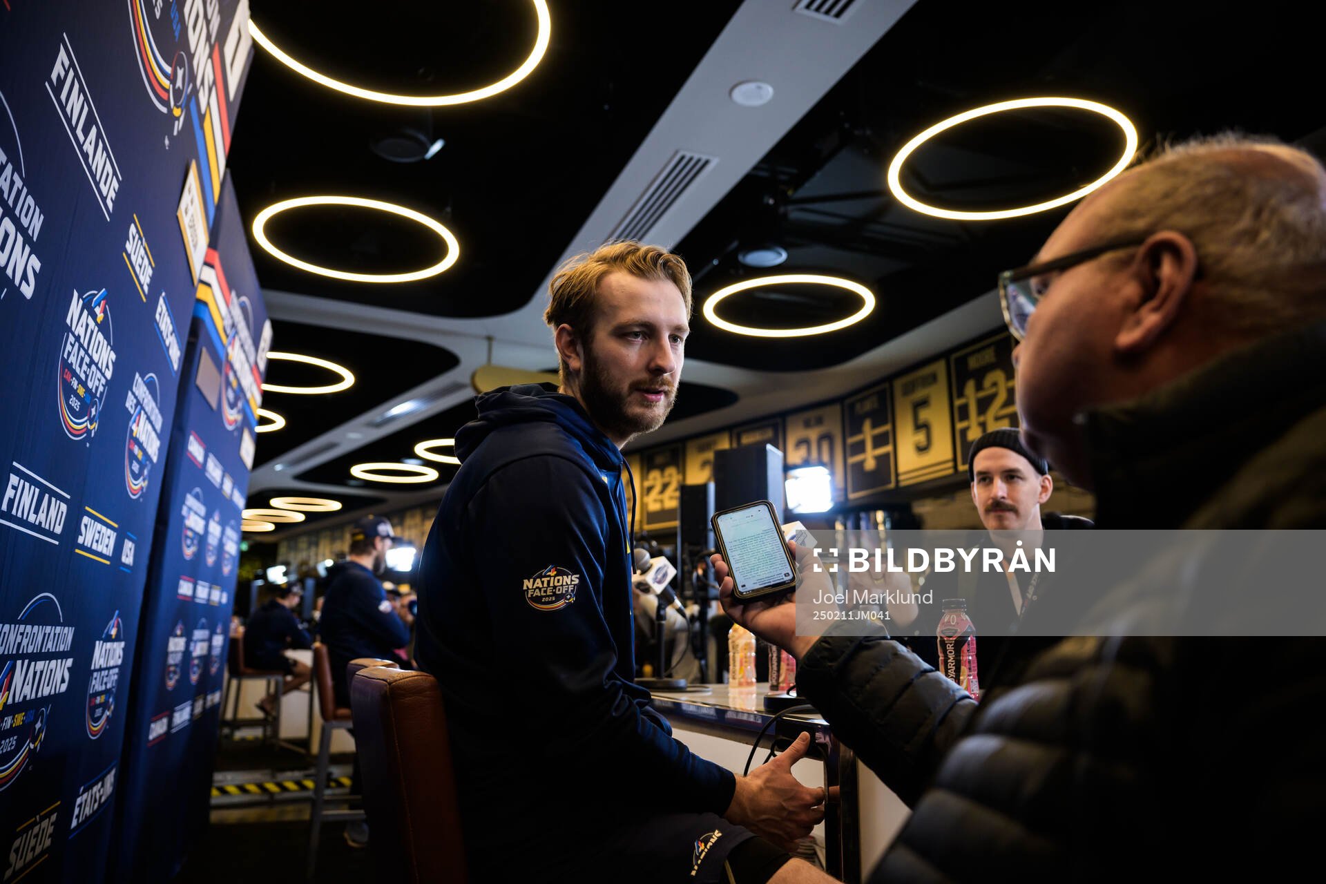 Goalkeeper Linus Ullmark of Sweden is being interviewed by
