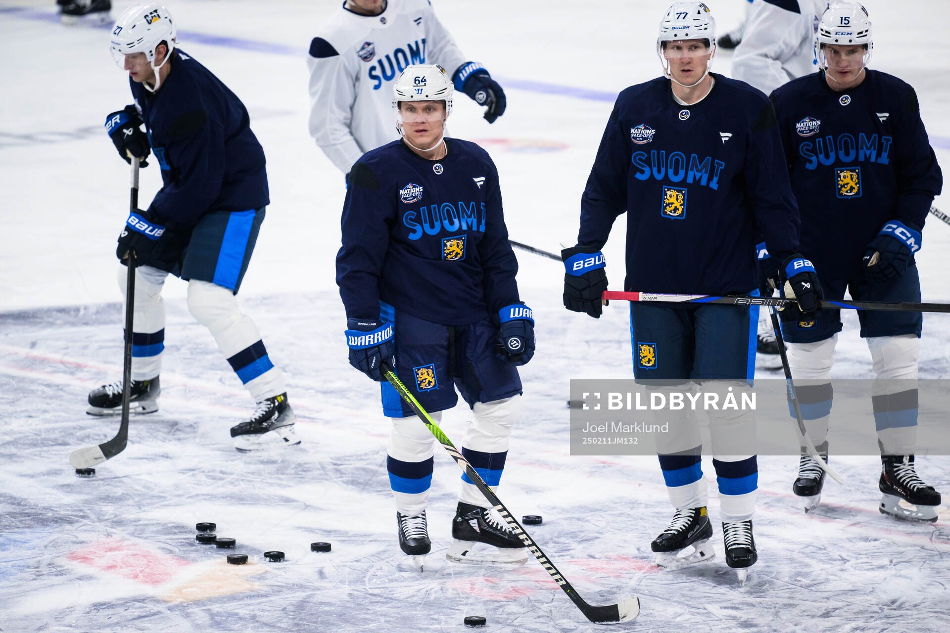 Mikael Granlund, Niko Mikkola and Anton Lundell of Finland