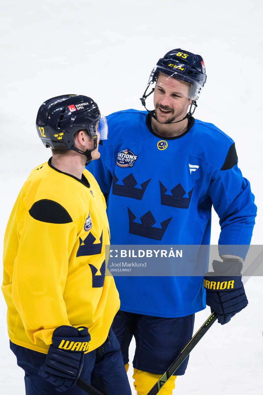 Gustav Nyquist and Erik Karlsson of Sweden at a practice