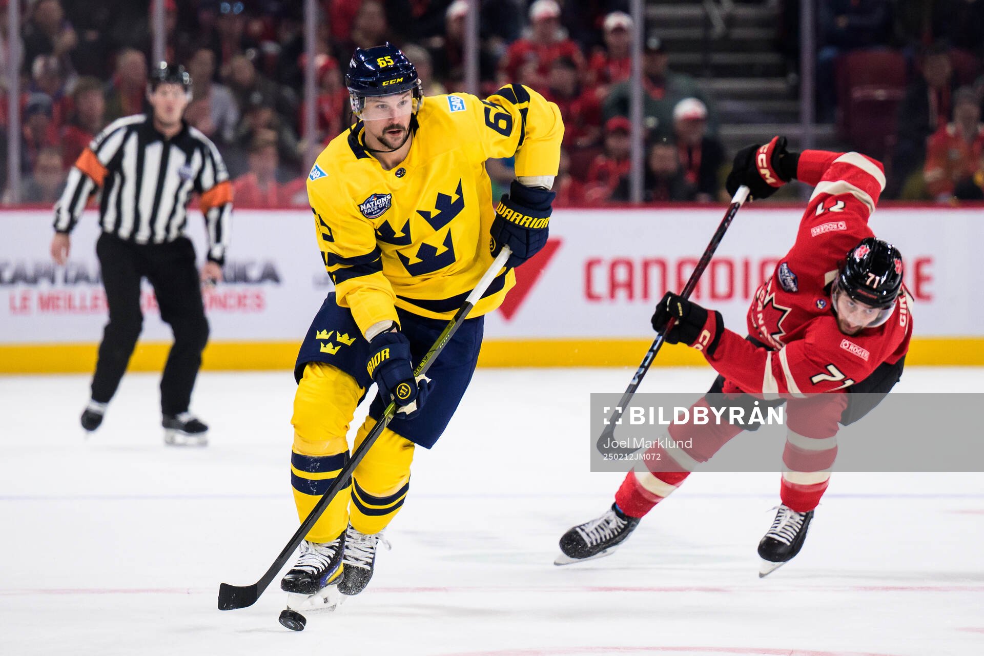 Erik Karlsson of Sweden and Anthony Cirelli of Canada