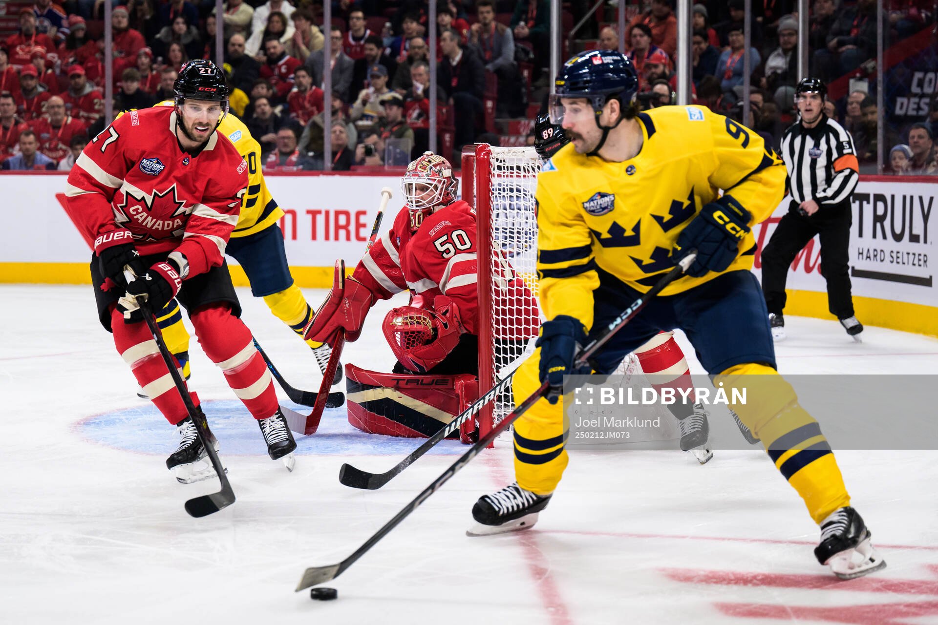 Shea Theodore and goaltender Jordan Binnington of Canada