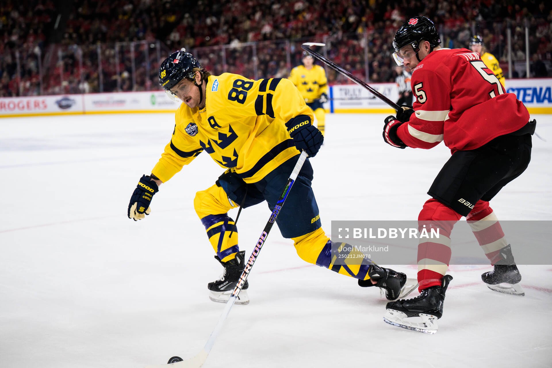 William Nylander of Sweden and Devon Toews of Canada