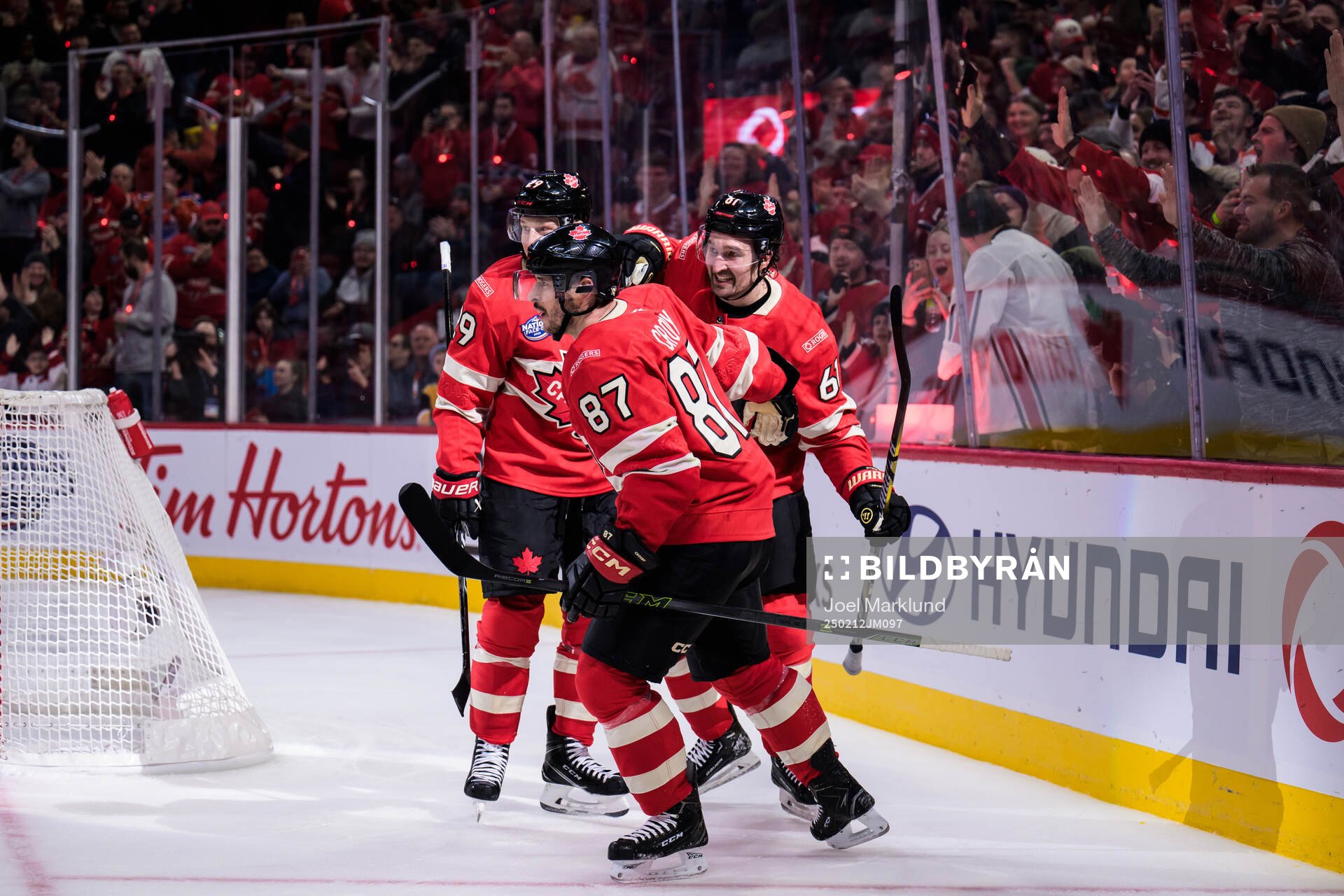 Nathan MacKinnon, Sidney Crosby and Mark Stone of Canada