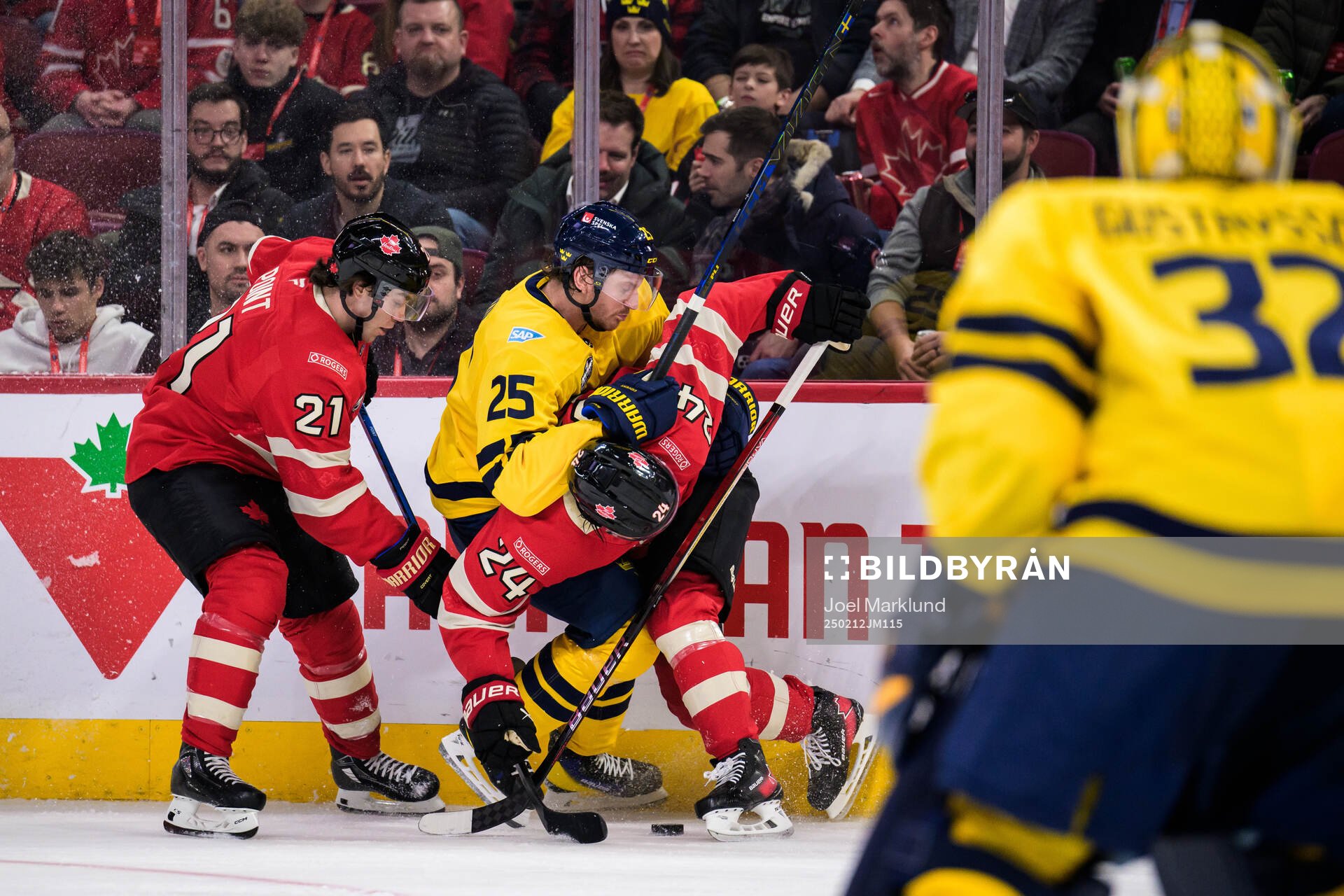Brayden Point and Seth Jarvis of Canada in action against