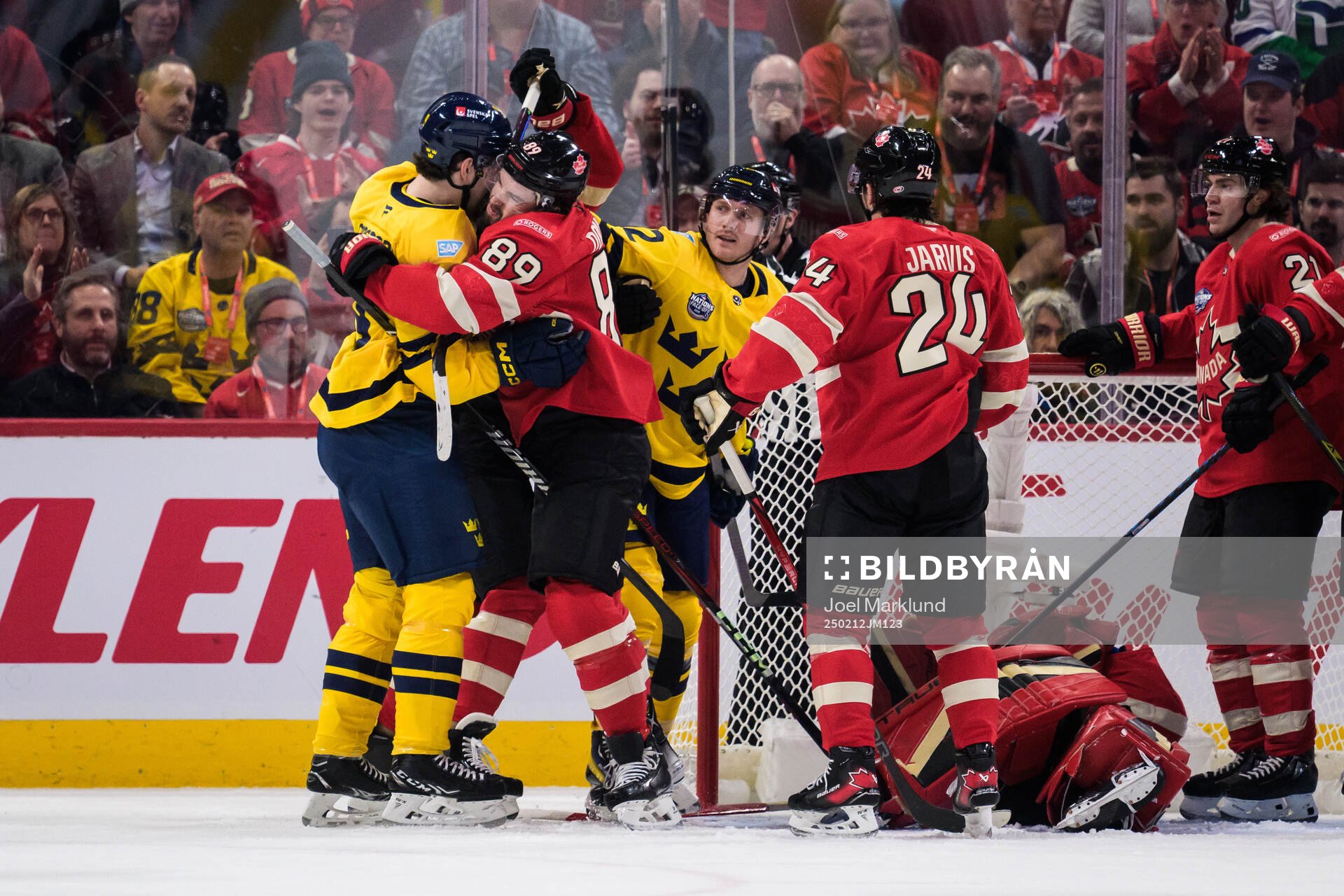 Filip Forsberg and Gustav Nyquist of Sweden and Drew