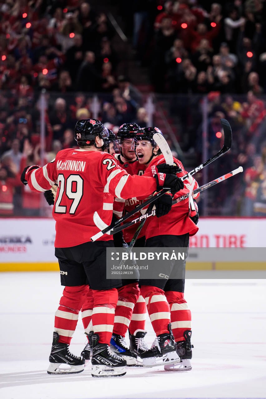 Mitch Marner of Canada celebrates with teammates