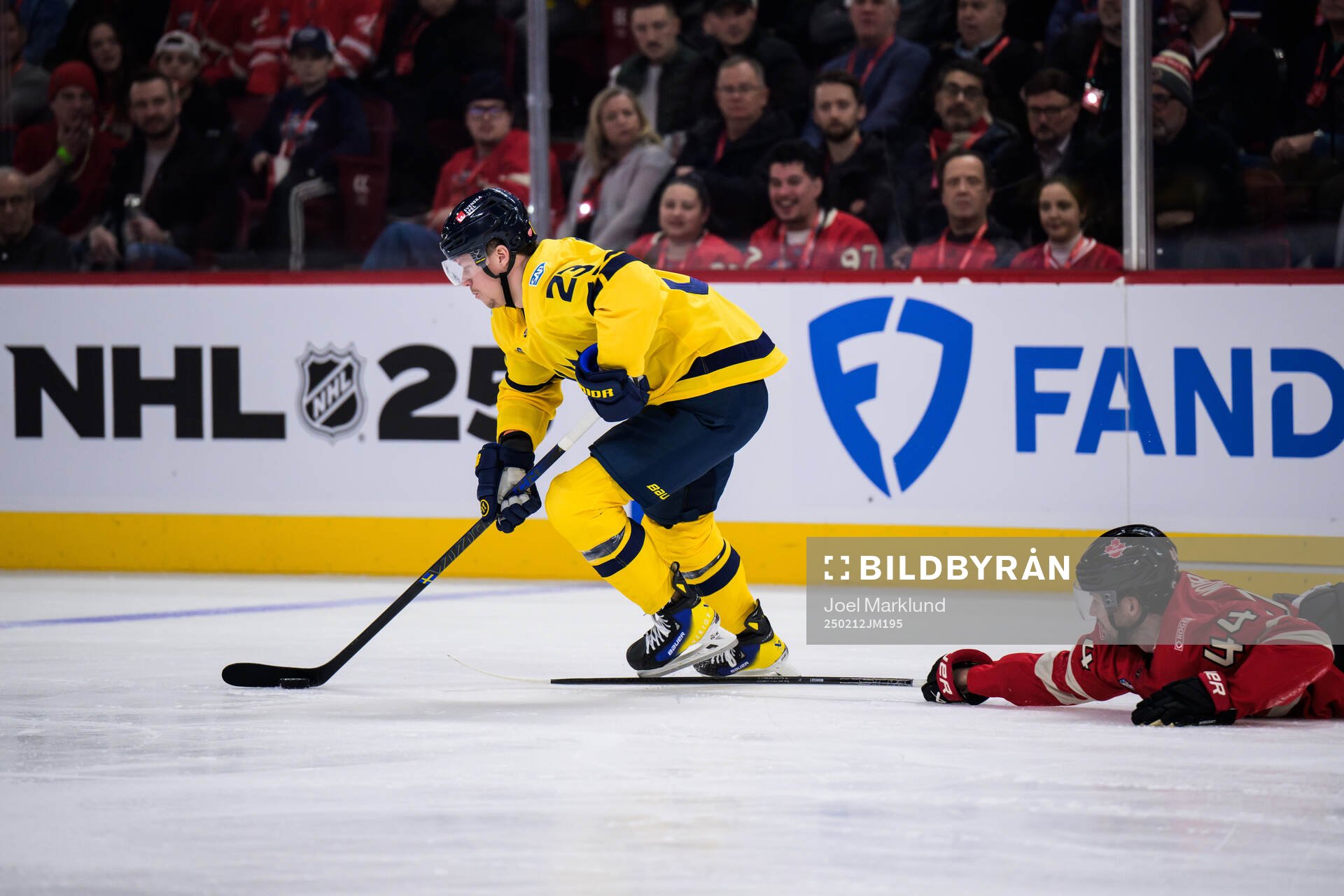 Lucas Raymond of Sweden and Josh Morrissey of Canada