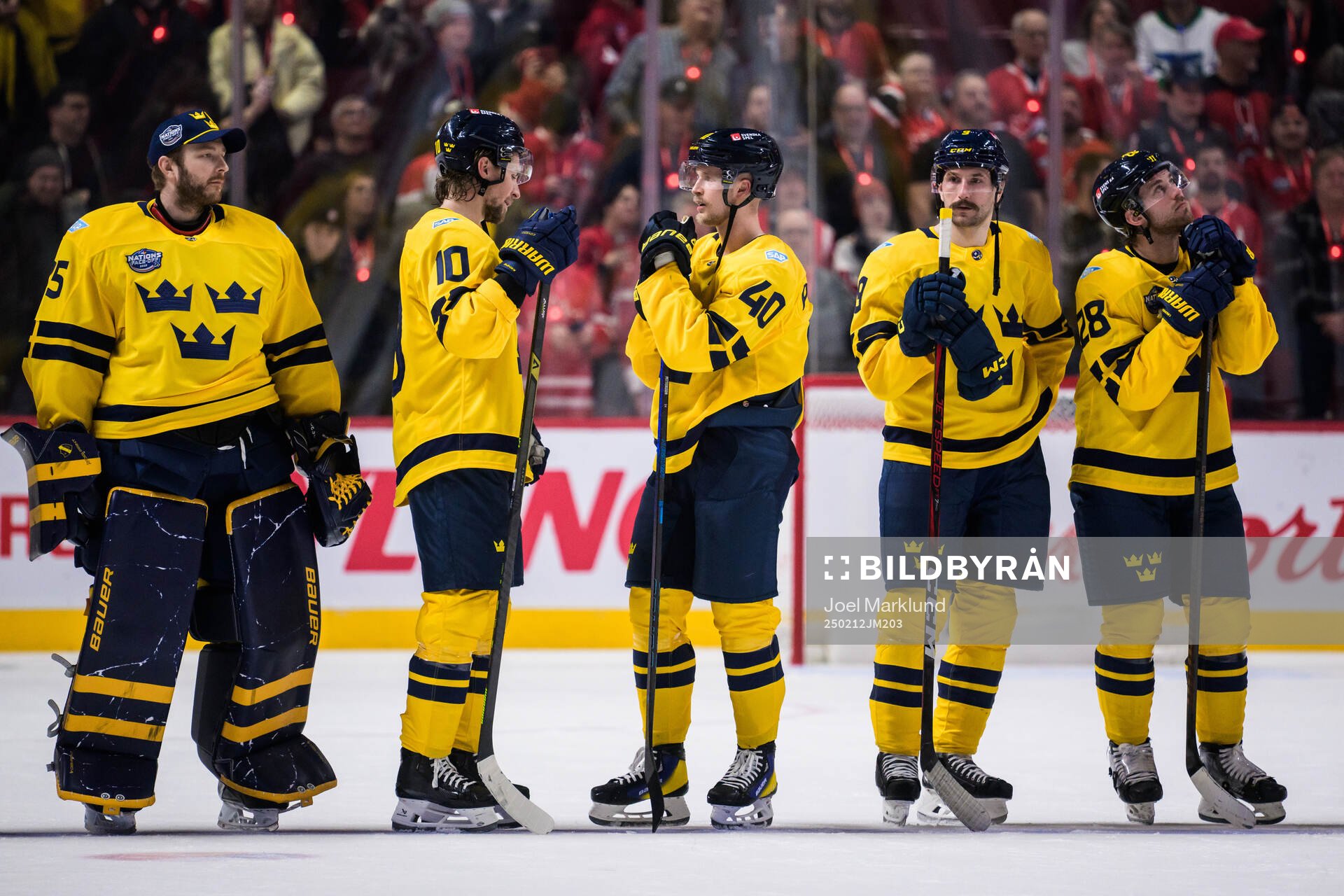 Goaltender Linus Ullmark, Adrian Kempe, Elias Pettersson,