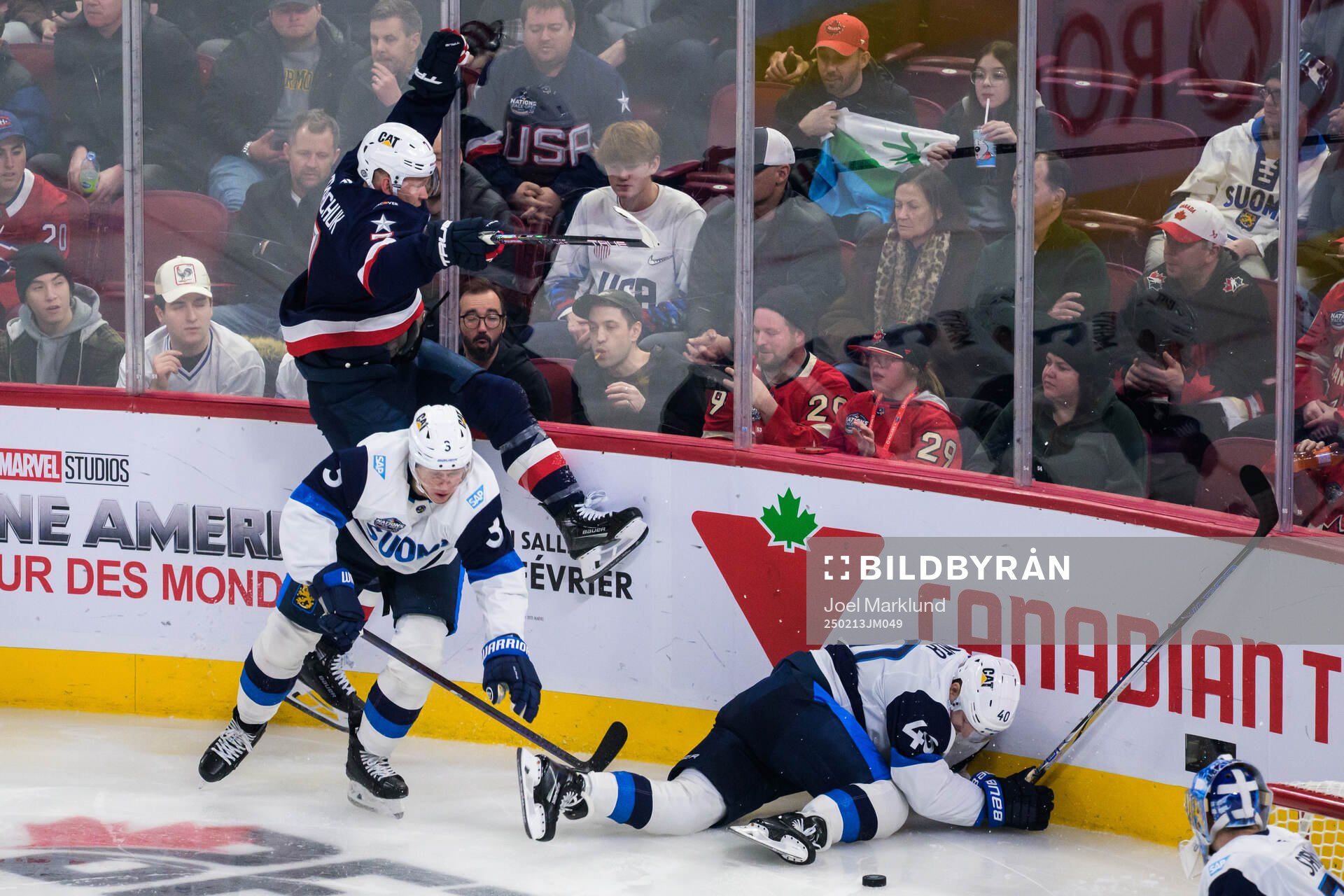 Brady Tkachuk of USA and Olli Määttä and Joel Armia of