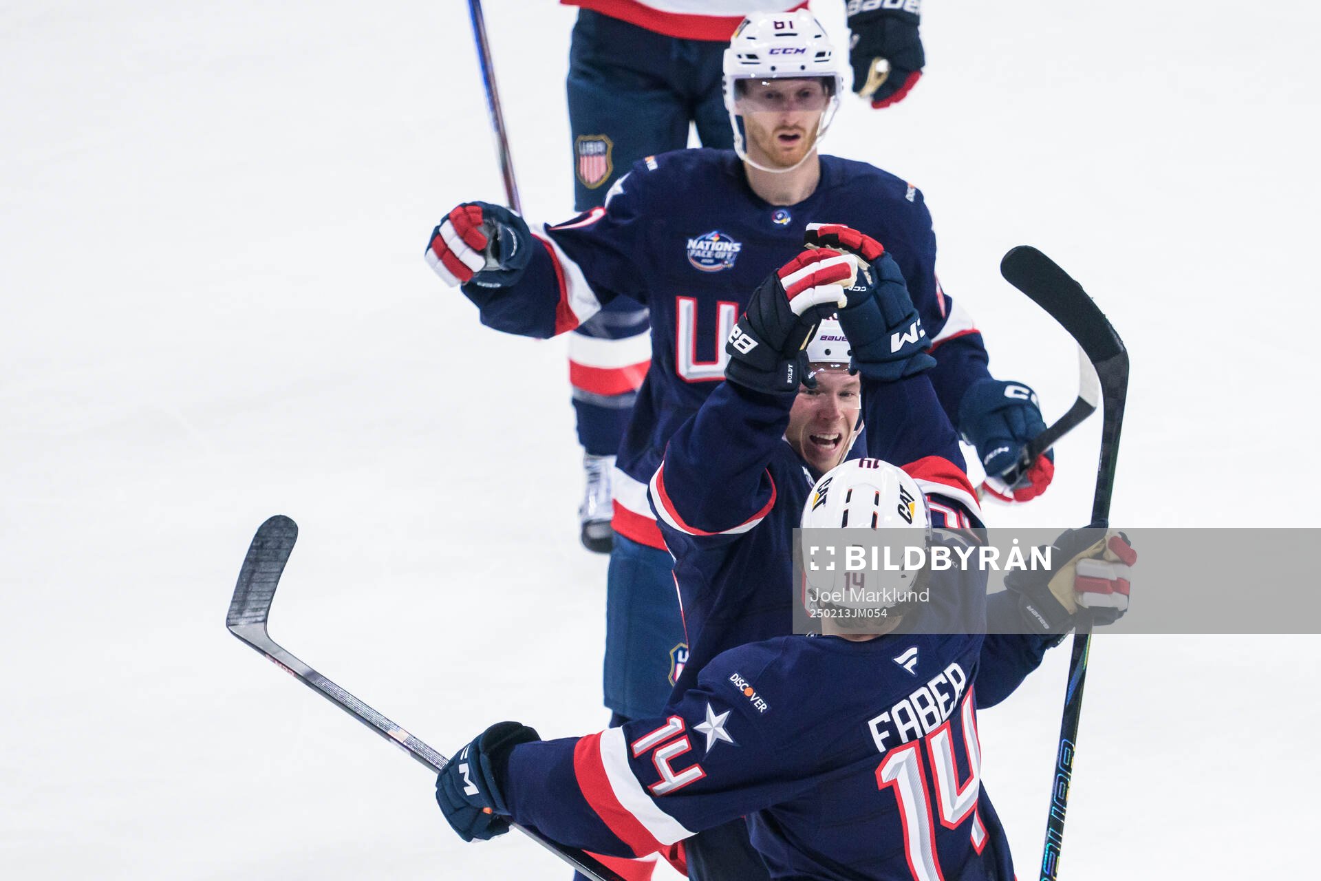 Brock Faber, Matt Boldy and Kyle Connor of USA celebrate