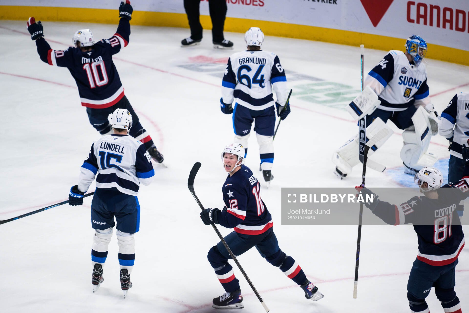 J.T. Miller, Matt Boldy and Kyle Connor of USA celebrate