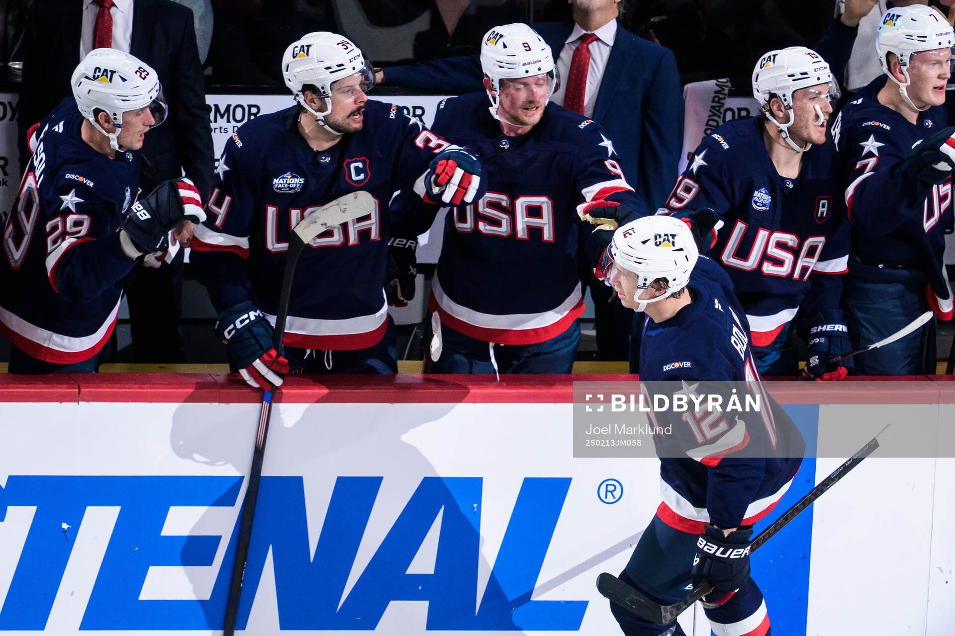 Matt Boldy of USA celebrates with teammates