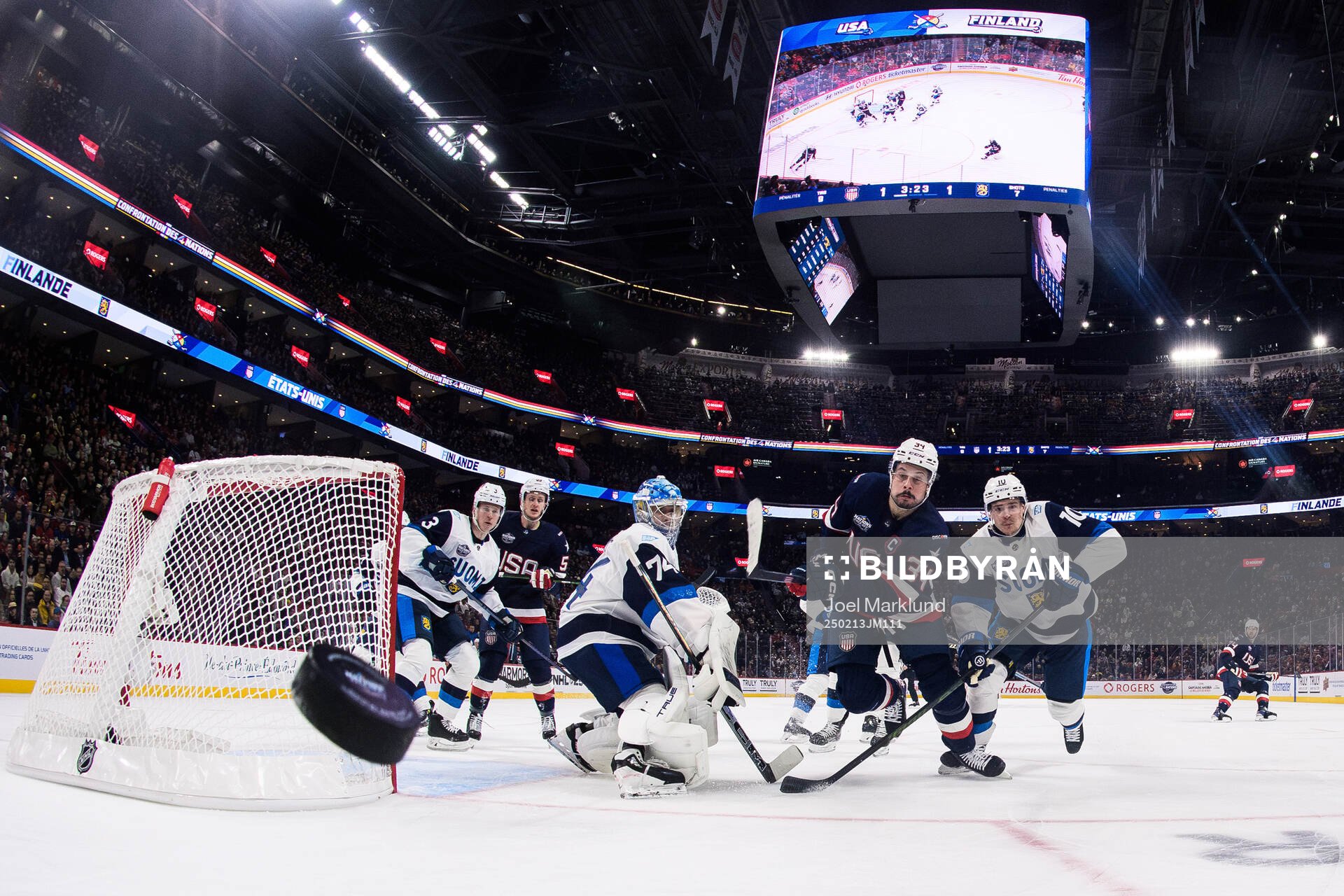 Goaltender Juuse Saros and Henri Jokiharju of Finland are
